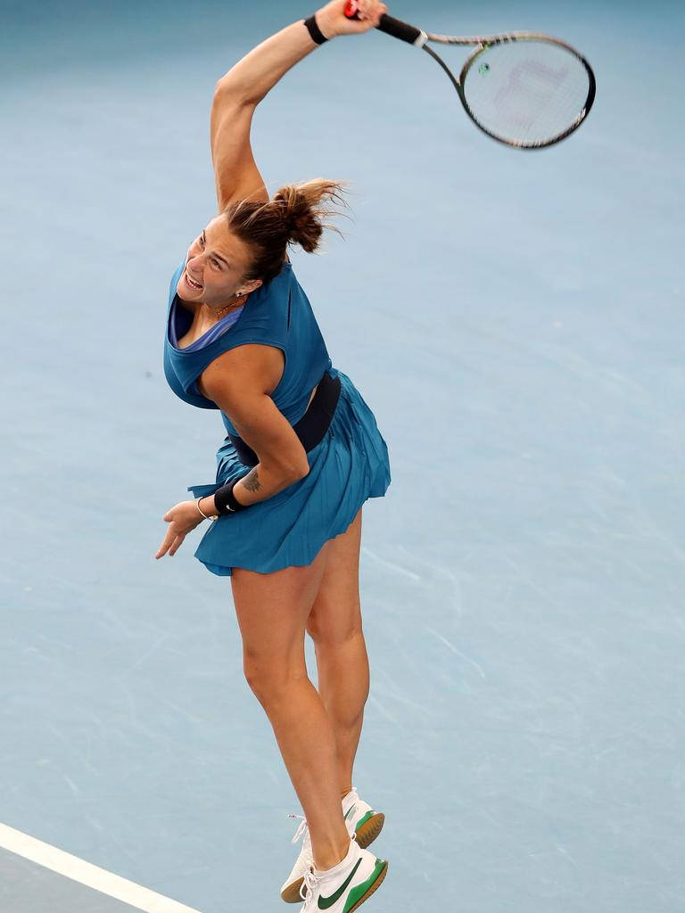 Aryna Sabalenka, powerful overhead smash, blue court, SD Phone Wallpaper