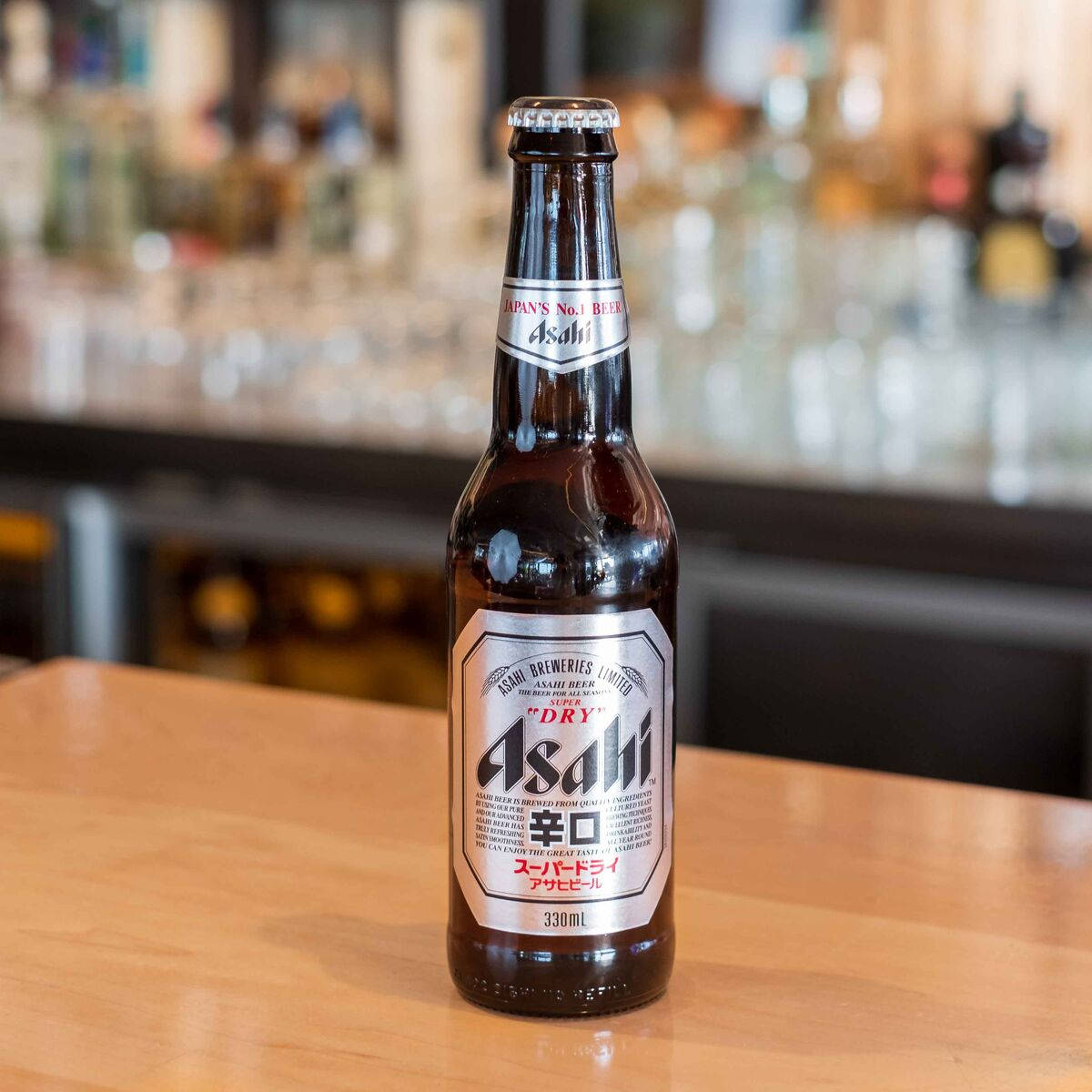 Asahi Super Dry, beer bottle, warm wooden bar top, SD Desktop Wallpaper