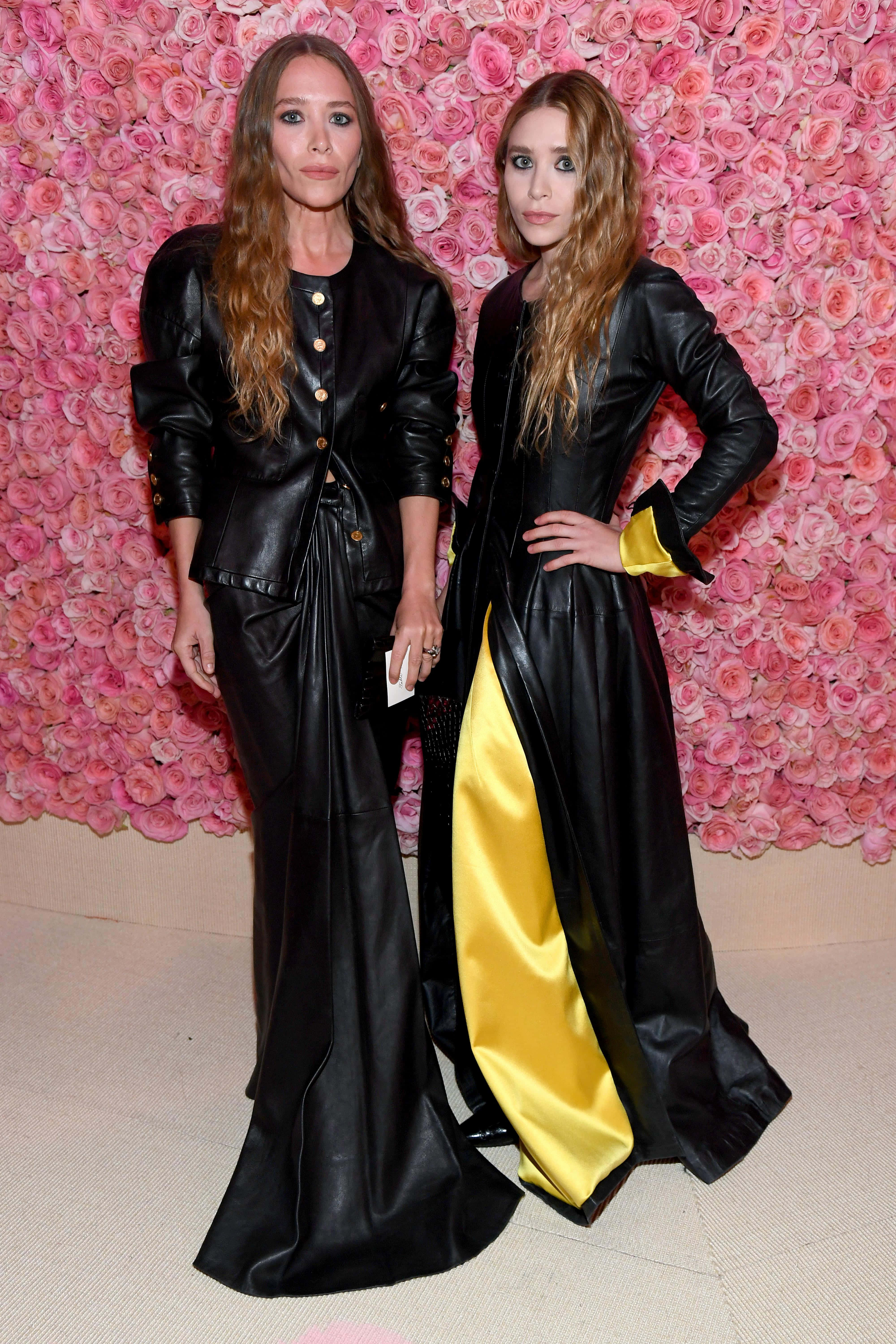 Ashley Olsen, black leather outfits, vibrant pink rose wall, 5K Phone Wallpaper