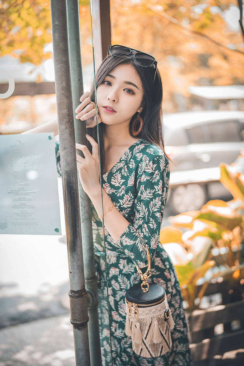 green floral dress, autumn leaves, soft sunlight, SD Phone Wallpaper
