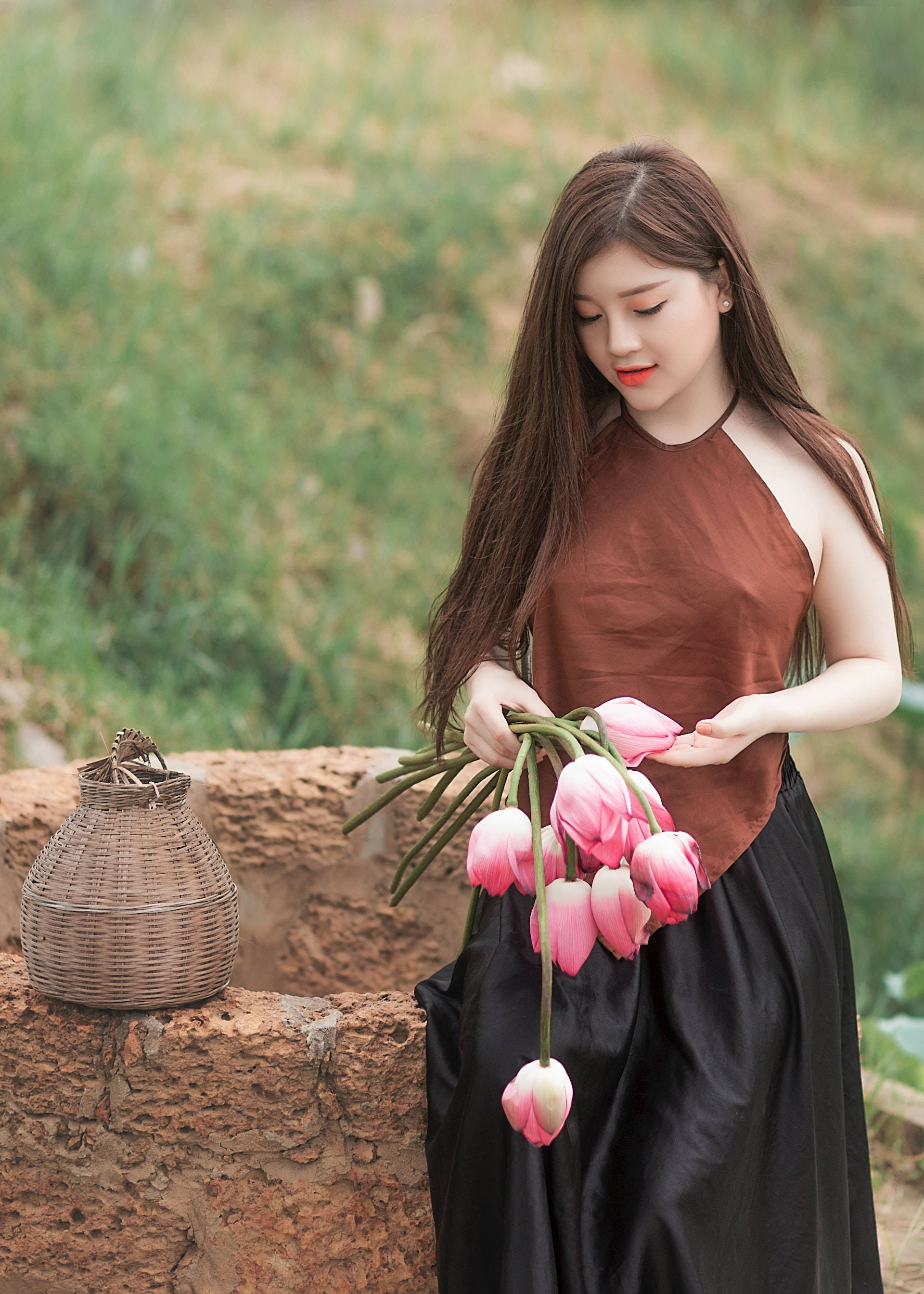 Asian woman, pink tulips, brown and black attire, 2K Phone Wallpaper