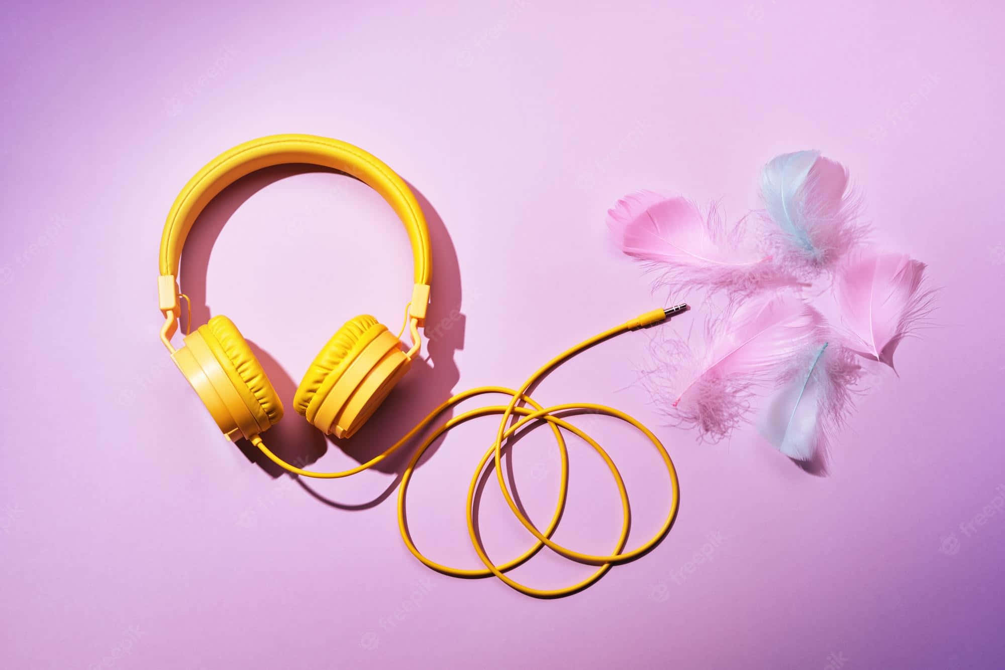 yellow headphones, feathers, pink background, Full HD Desktop Wallpaper