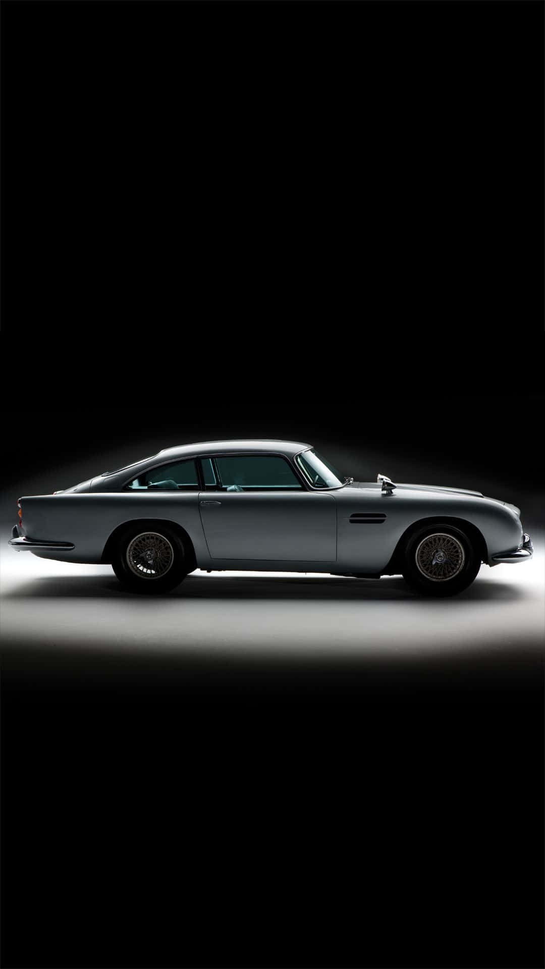 Aston Martin DB5, silver, dramatic spotlight, Full HD Phone Wallpaper
