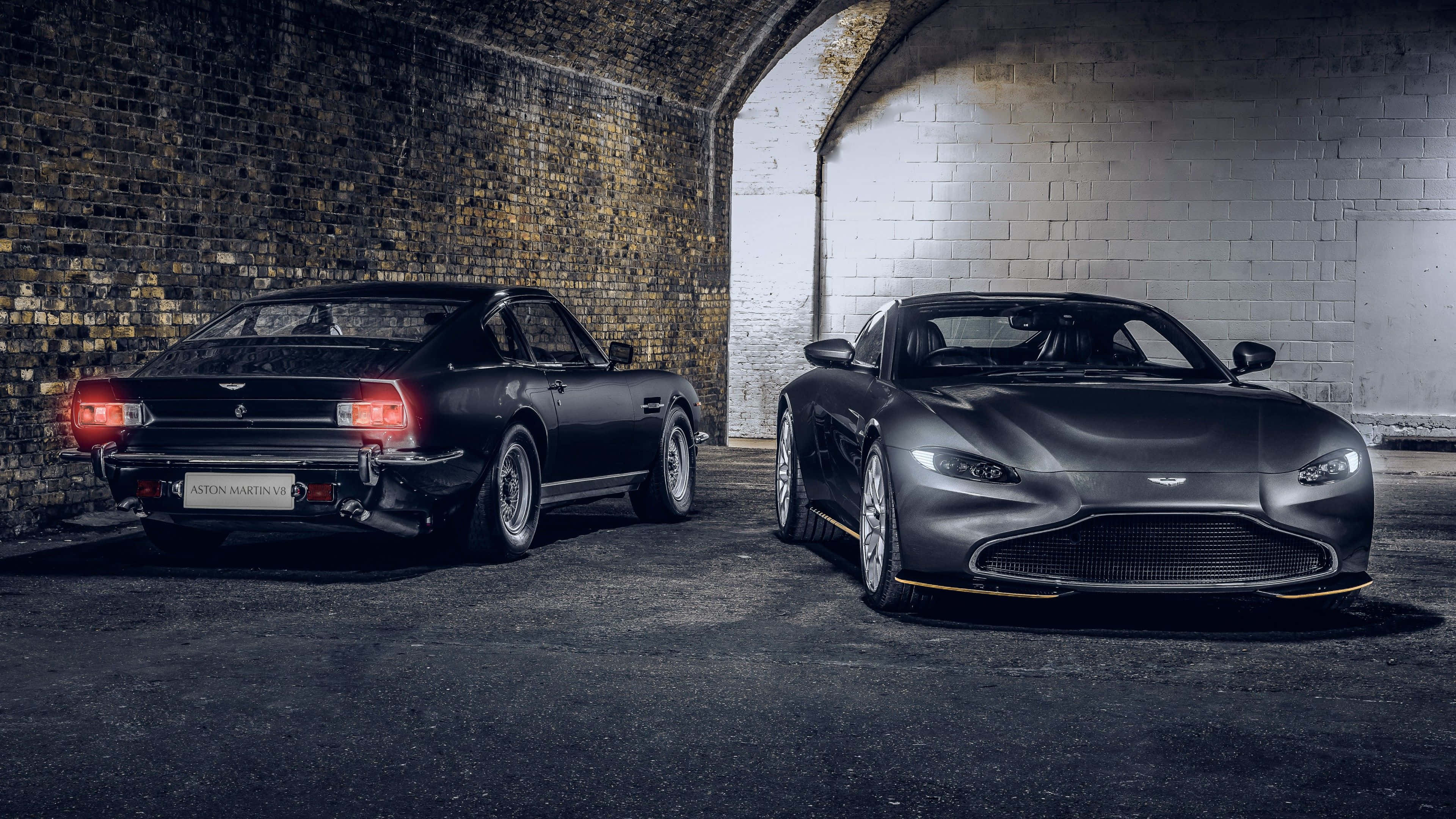 Aston Martin V12 Vantage, matte black, dimly lit brick tunnel, 4K Desktop Wallpaper