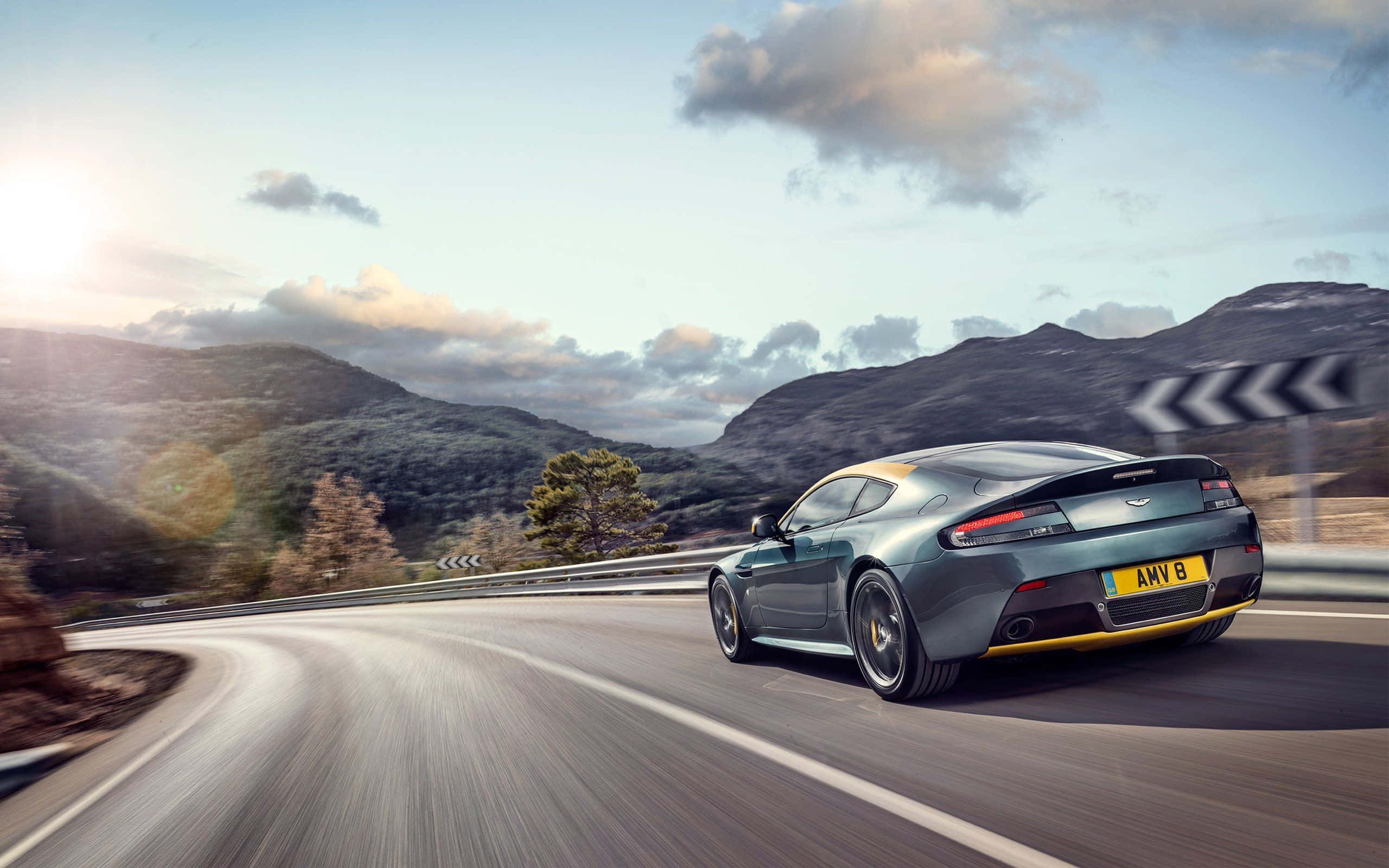 Aston Martin V12 Vantage, teal, winding mountain road, 2K Desktop Wallpaper