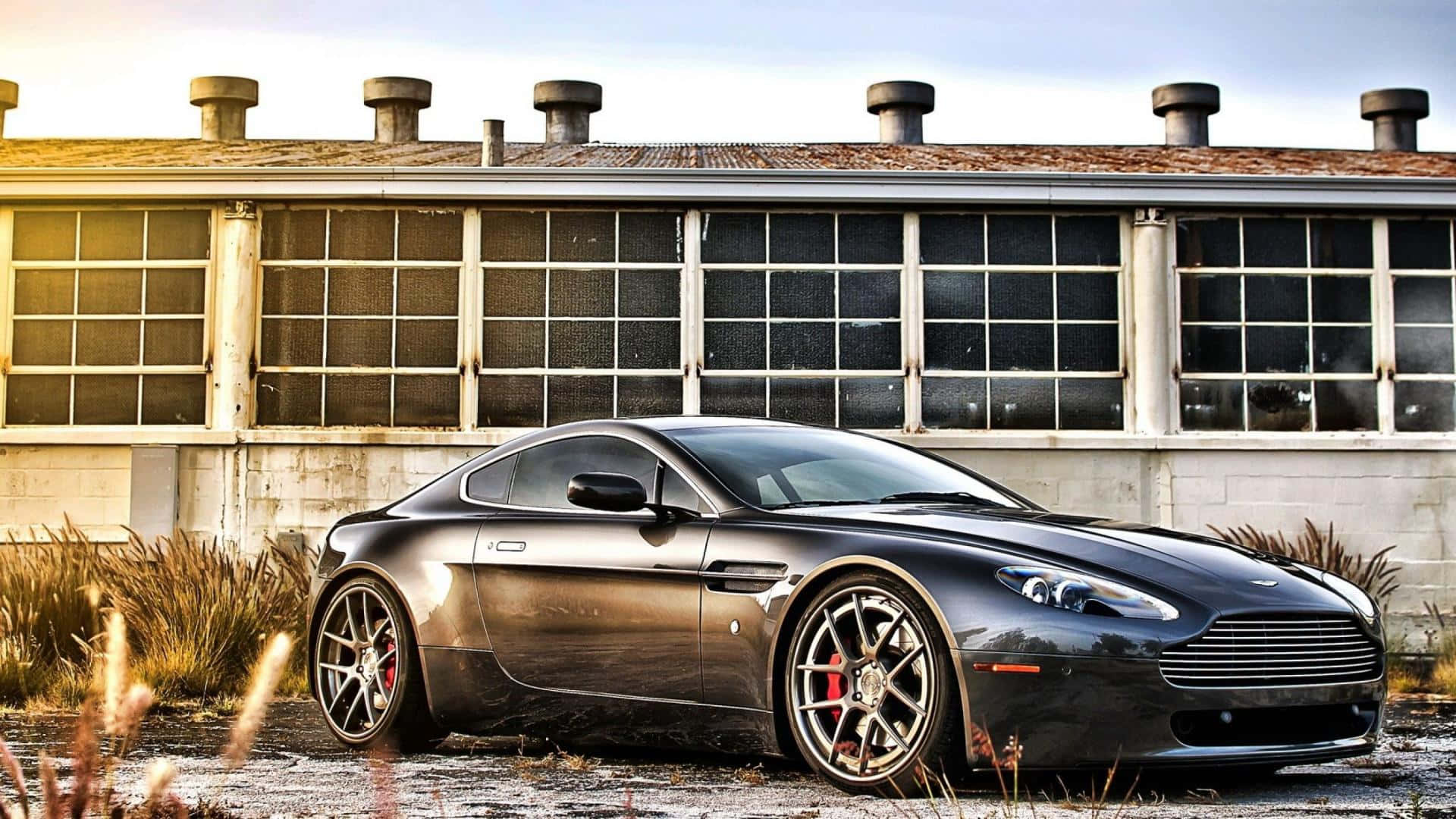 Aston Martin V12 Vantage, matte black, industrial building, Full HD Desktop Wallpaper