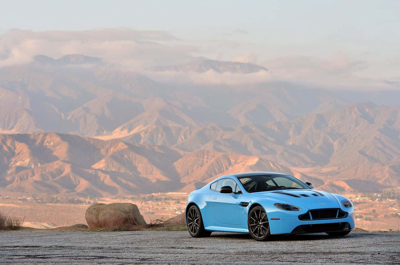 Aston Martin V12 Vantage, desert overlook, layered mountain ranges, HD Desktop Wallpaper
