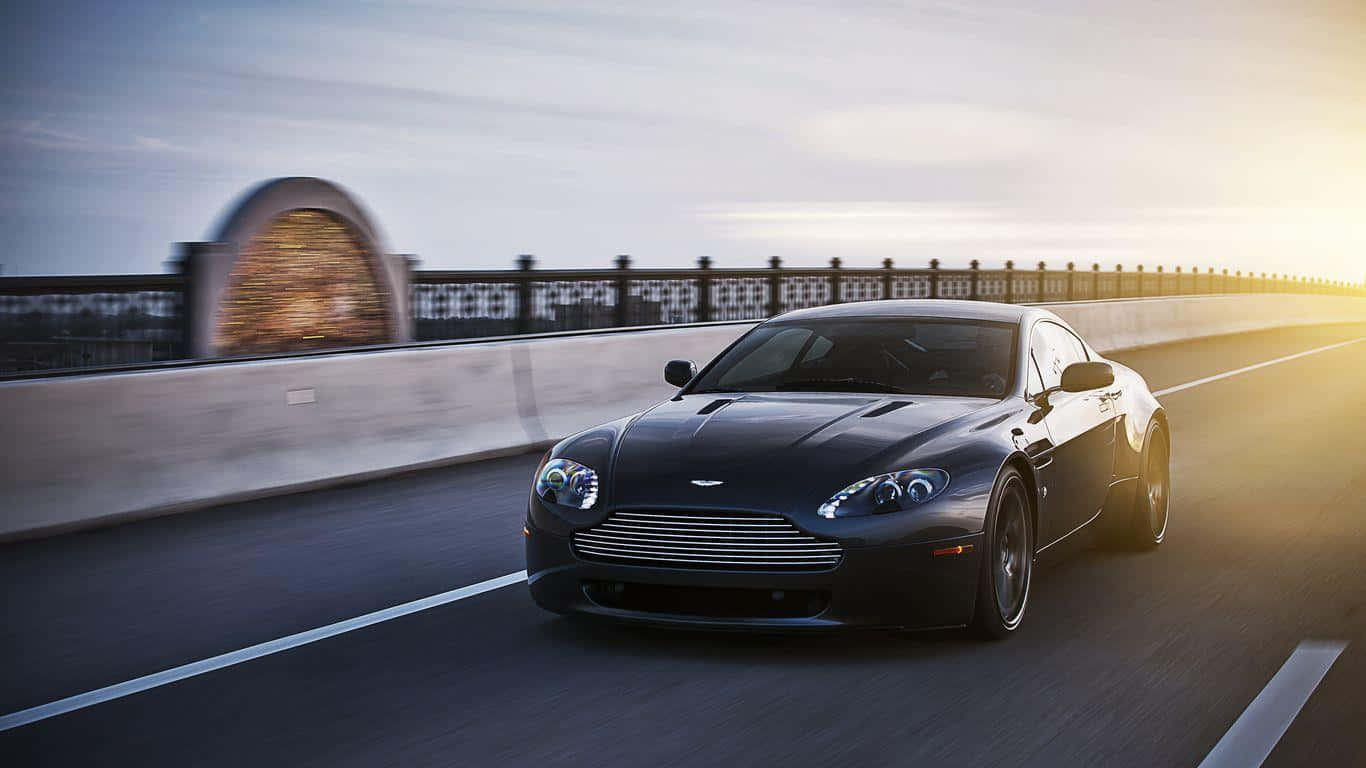 Aston Martin V12 Vantage, black, sunlit highway bridge, HD Desktop Wallpaper