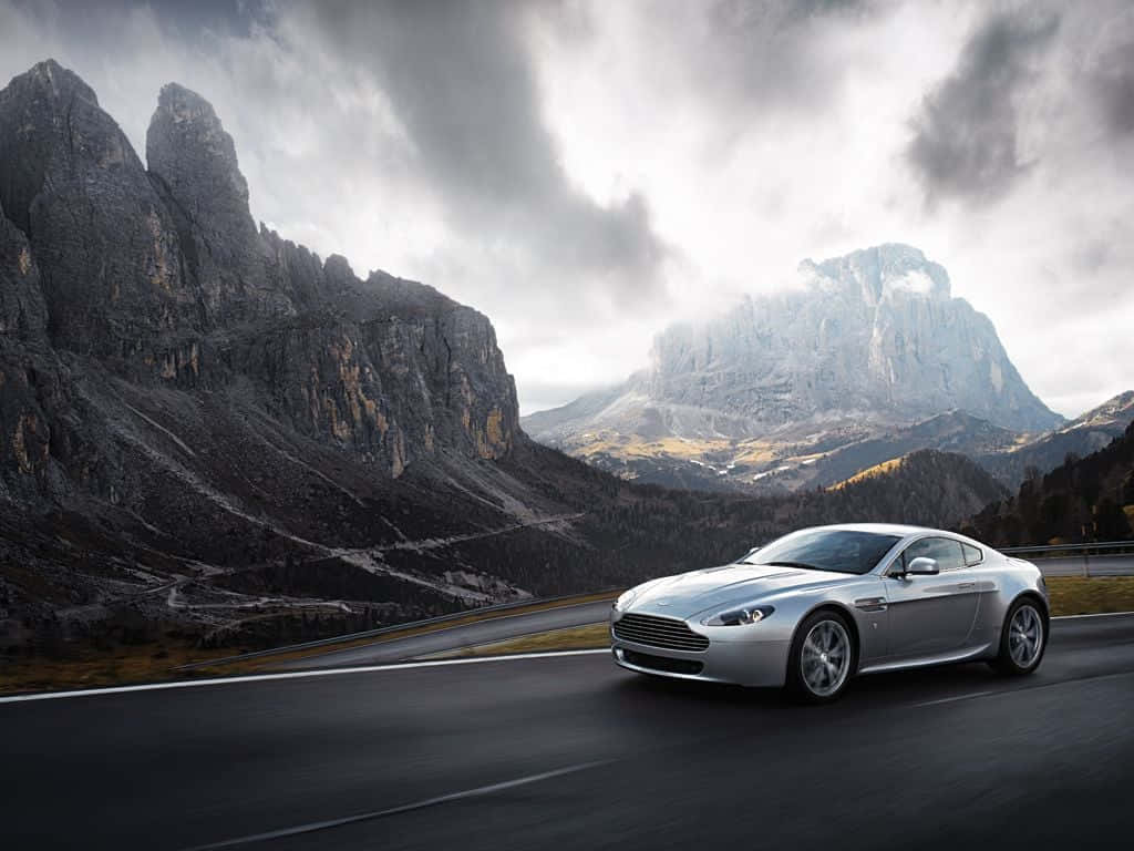 Aston Martin V12 Vantage, silver, winding mountain road, SD Desktop Wallpaper