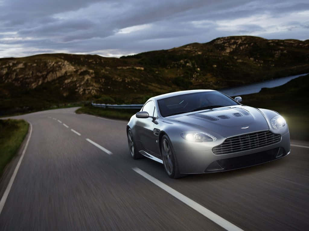 Aston Martin V12 Vantage, silver, winding mountain road, SD Desktop Wallpaper