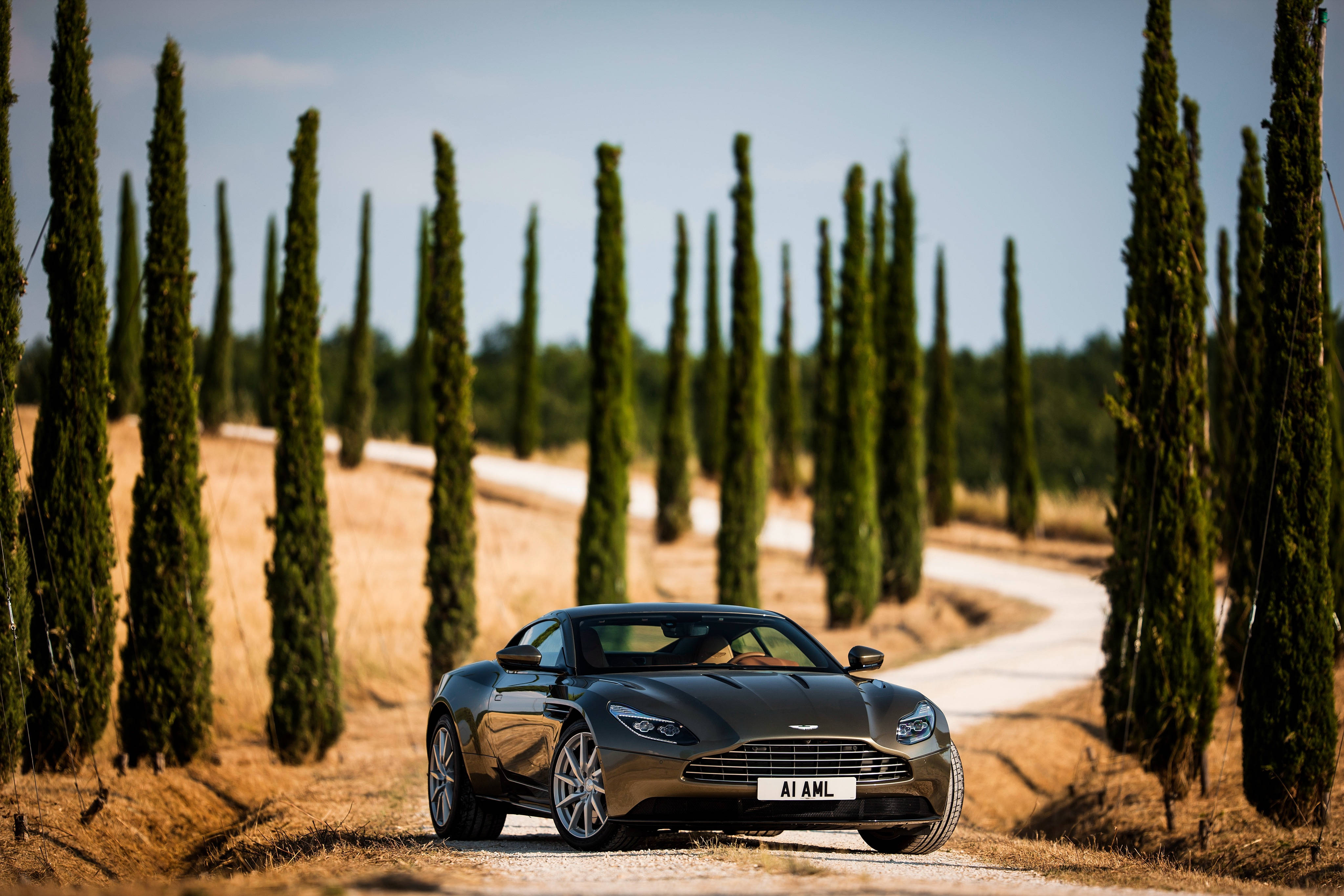 Aston Martin Vanquish, black, gravel road, 4K Desktop Wallpaper