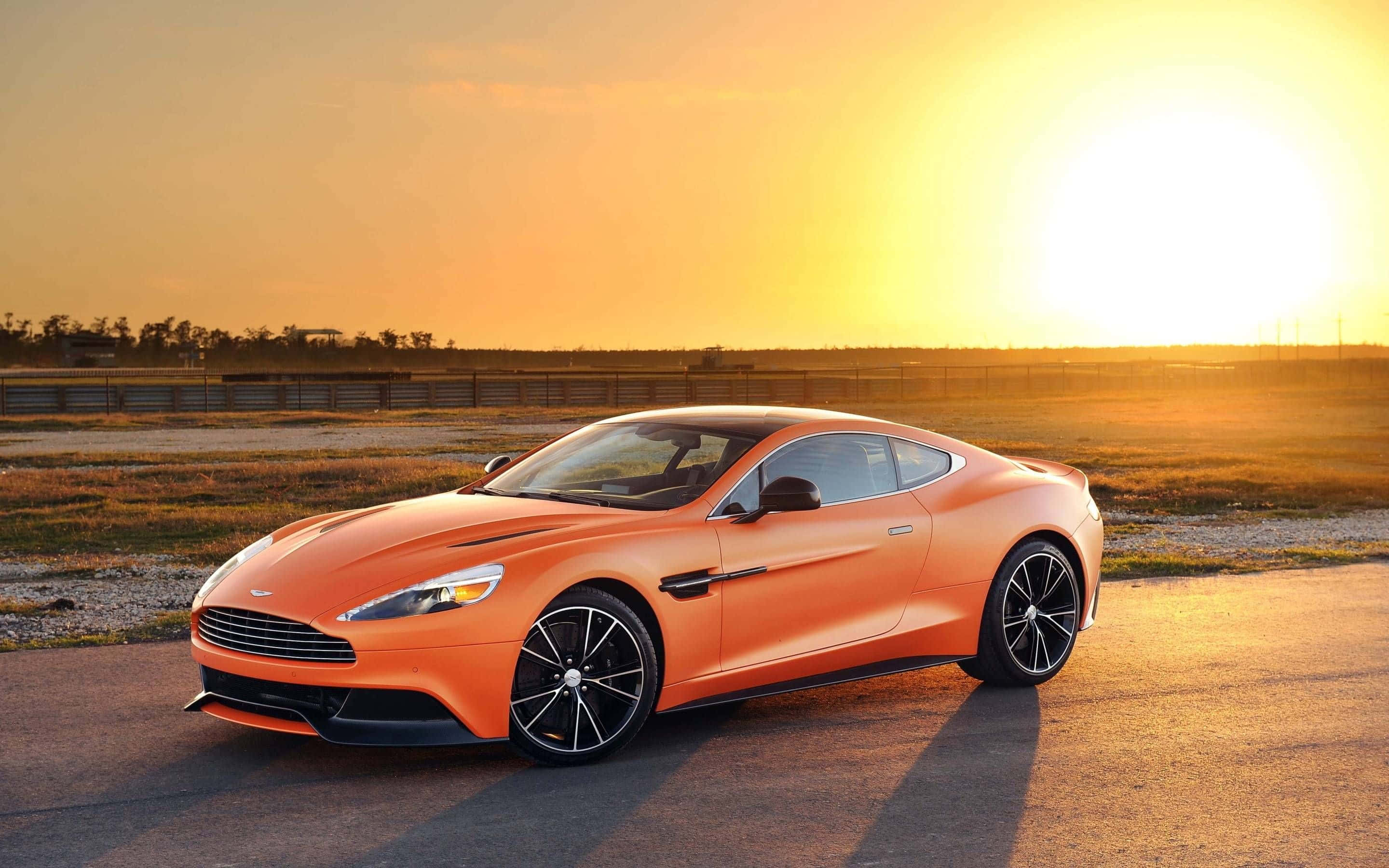 Aston Martin Vanquish, orange, golden sunset, 2K Desktop Wallpaper