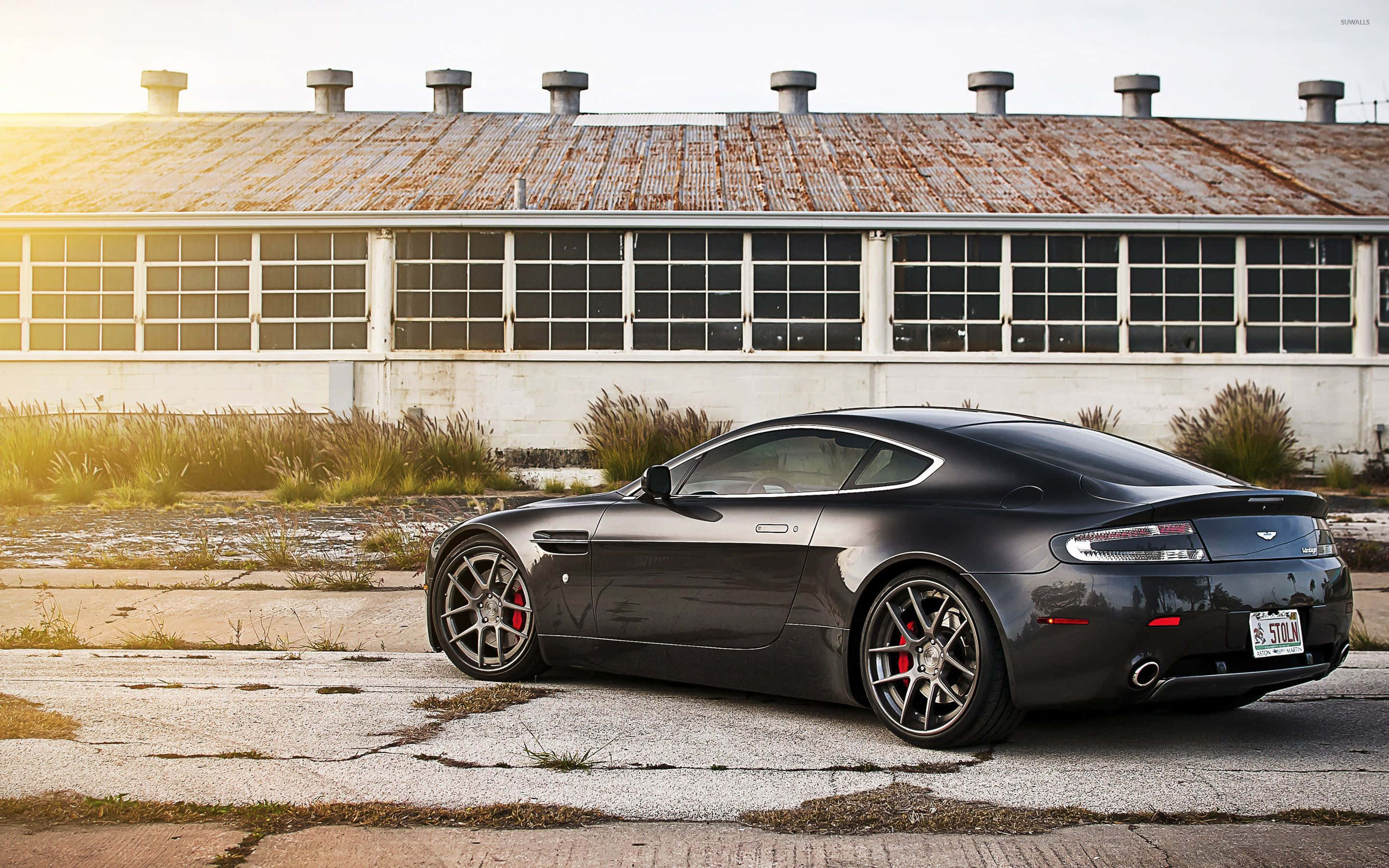 Aston Martin Vanquish, black, cracked pavement, 2K Desktop Wallpaper