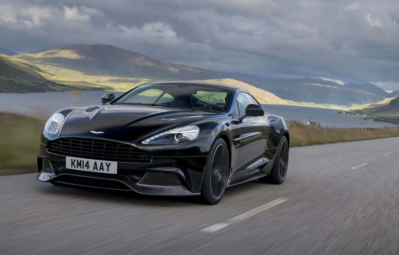 Aston Martin Vanquish, sleek black, winding road, HD Desktop Wallpaper