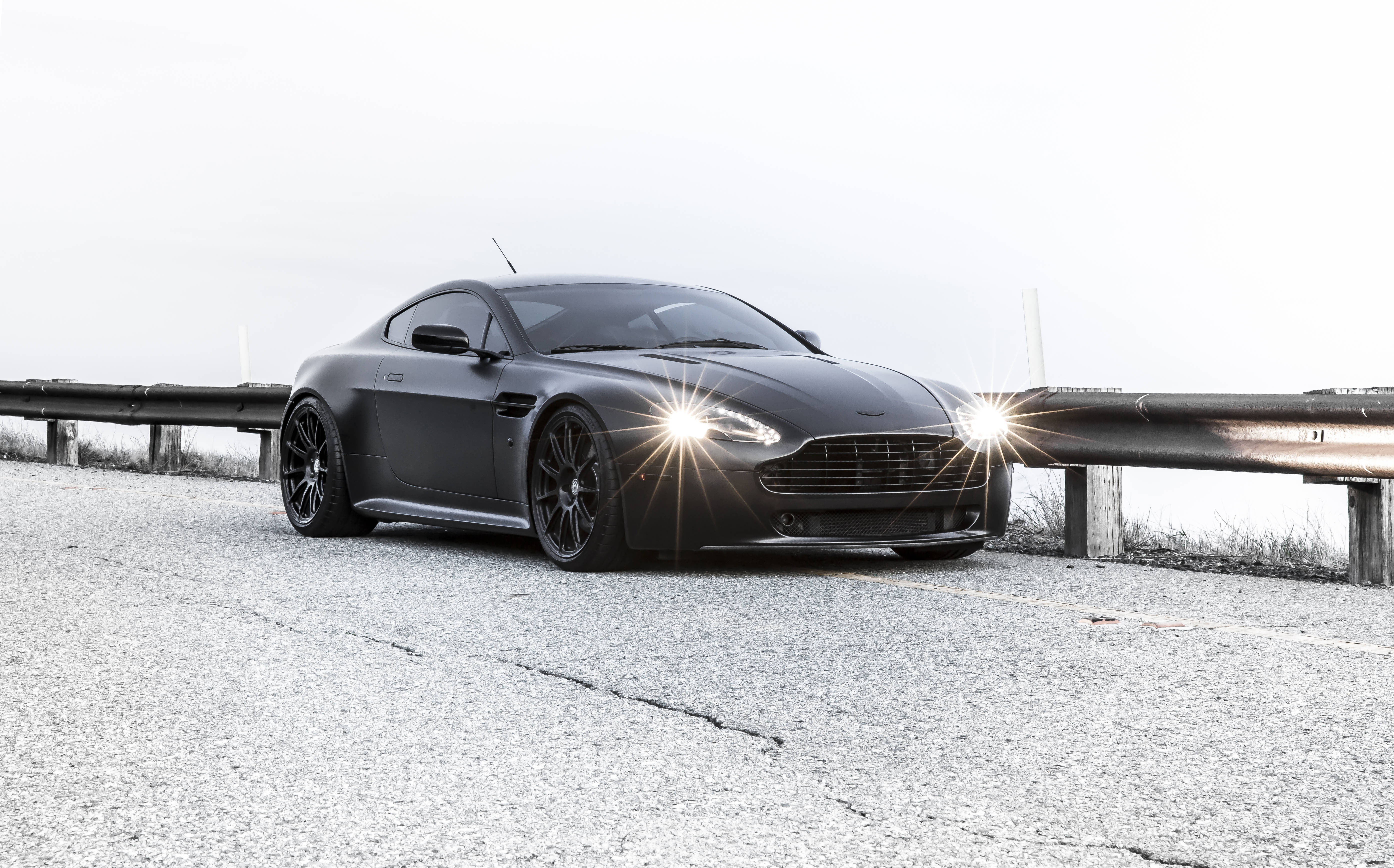 Aston Martin Vantage, matte black, glowing headlights, 5K Desktop Wallpaper