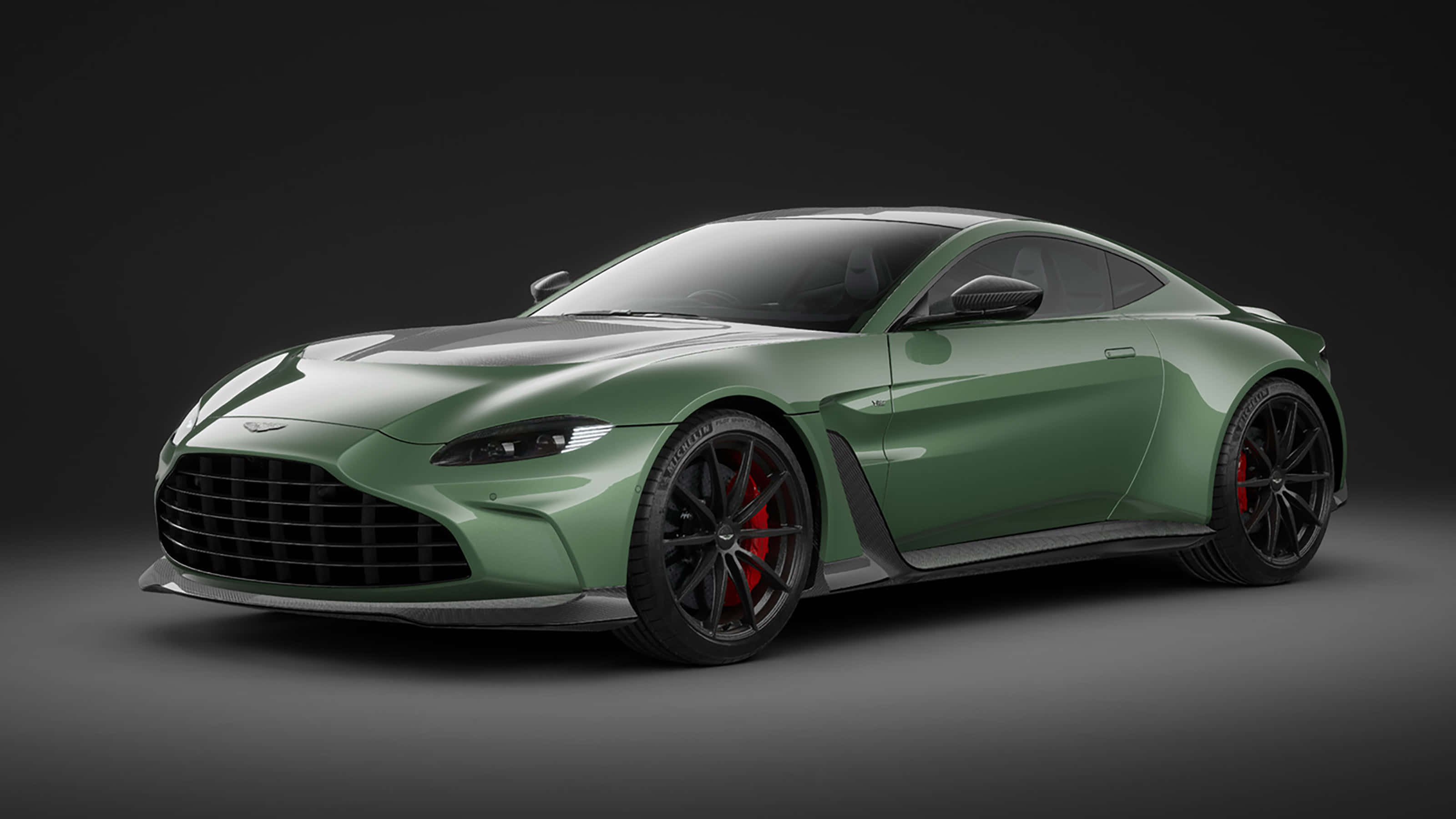 Aston Martin Vantage, matte green, black wheels, 2K Desktop Wallpaper