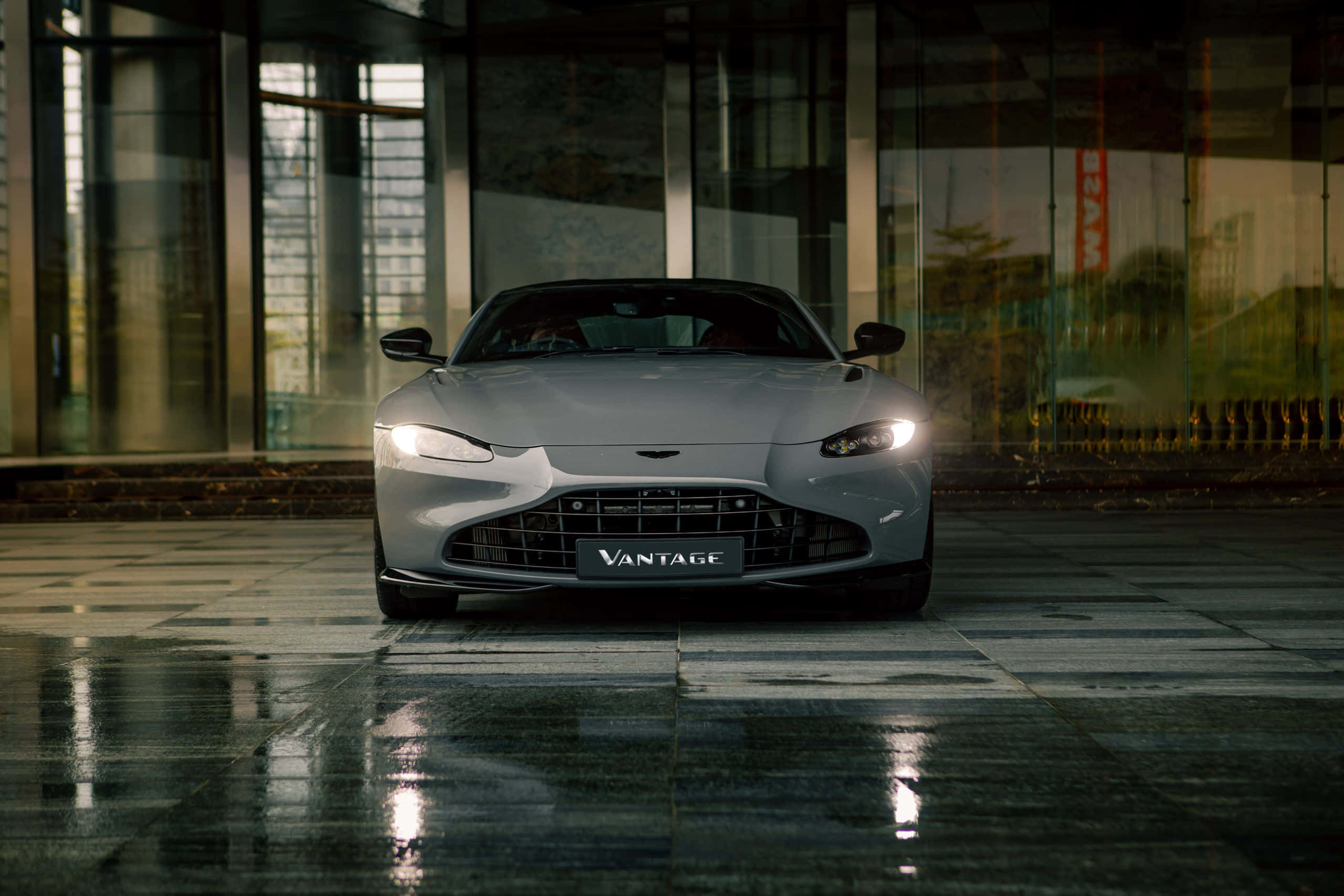 Aston Martin Vantage, silver, wet tiled plaza, 2K Desktop Wallpaper