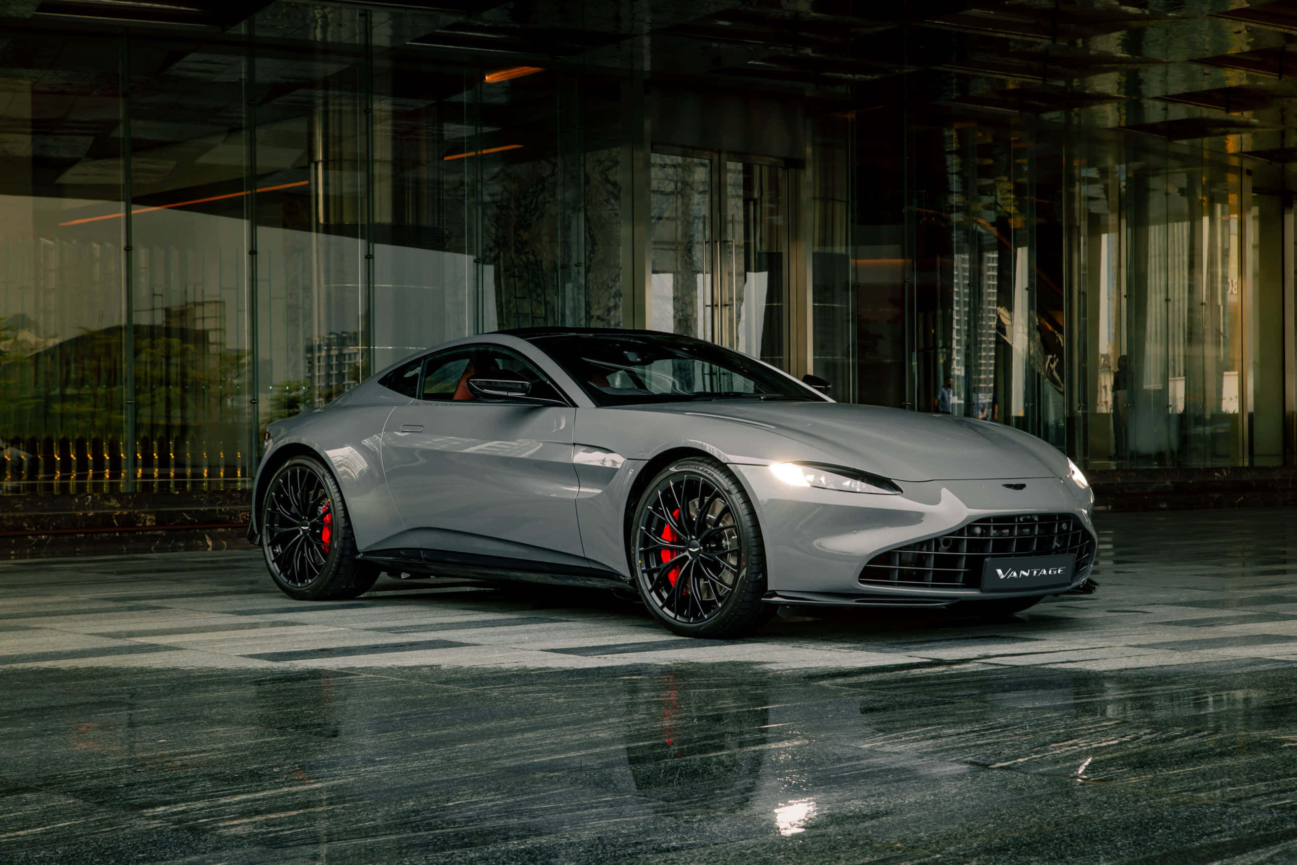 Aston Martin Vantage, silver, wet reflective pavement, 2K Desktop Wallpaper