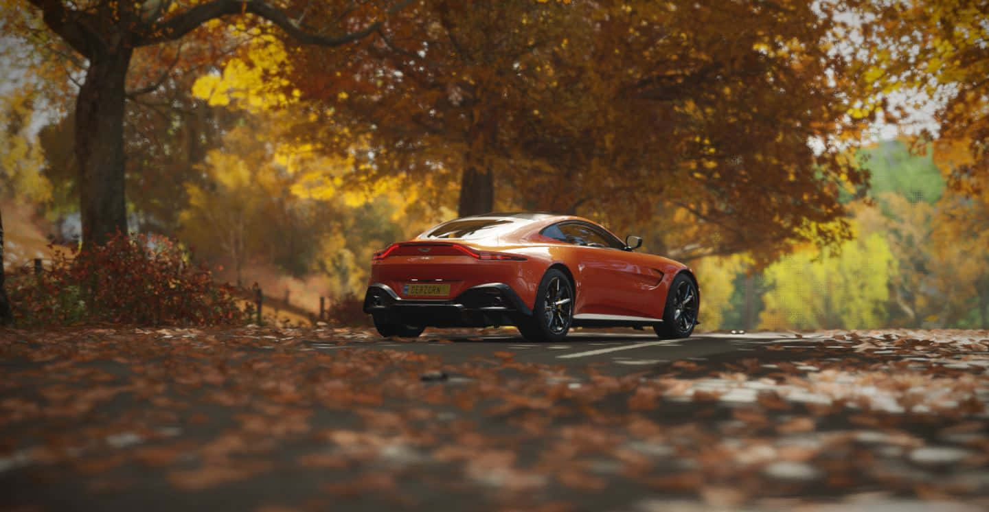 Aston Martin Vantage, orange, leaf-strewn road, HD Desktop Wallpaper