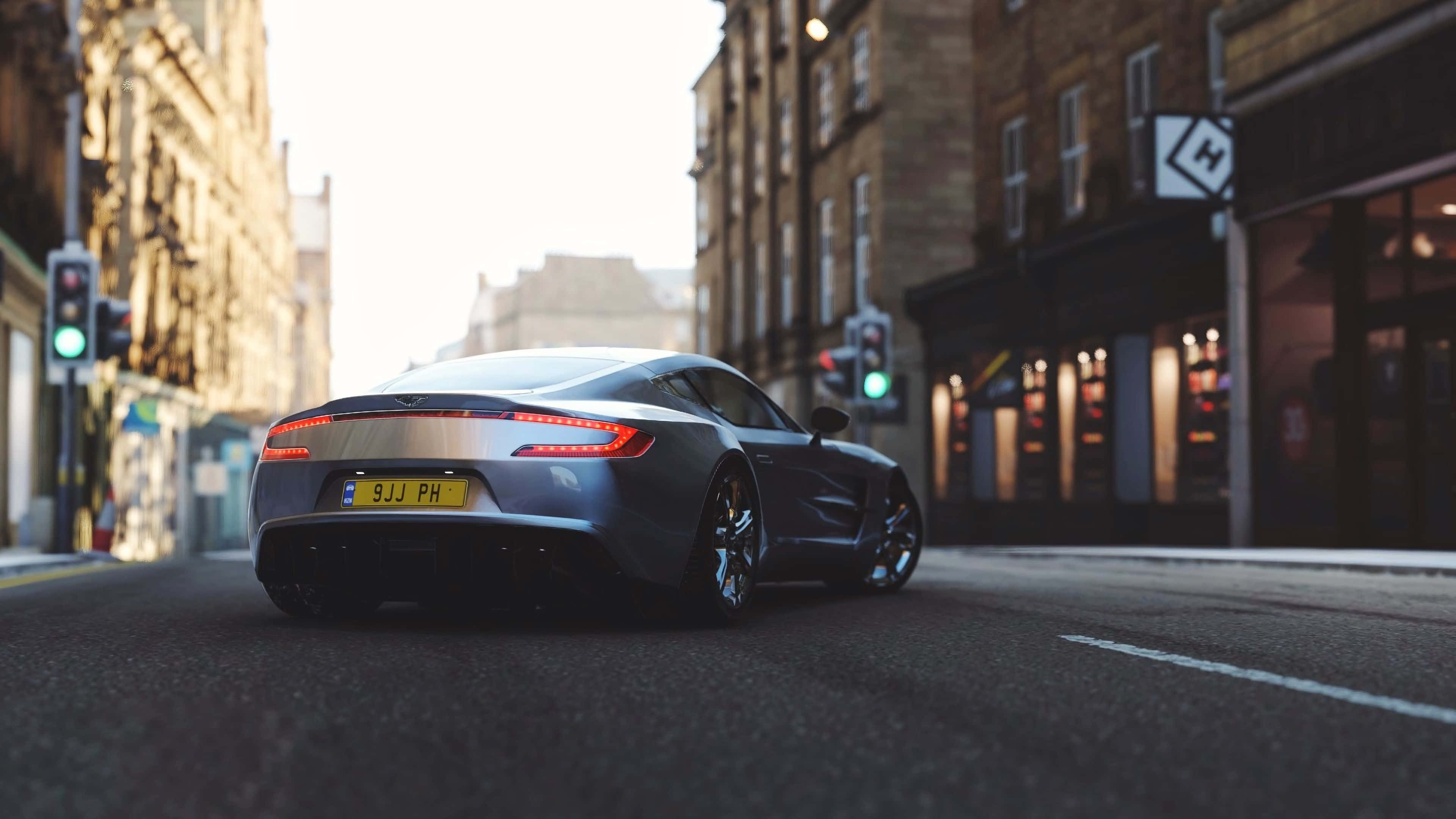 Aston Martin One-77, silver, sunlit urban street, 4K Desktop Wallpaper