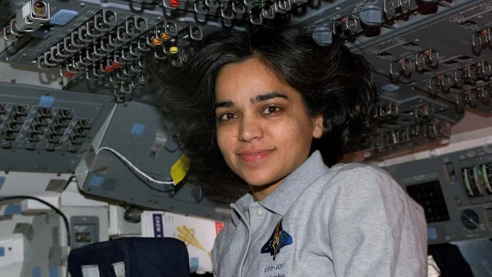 Astronaut, space shuttle cockpit, woman with dark hair, HD Desktop Wallpaper