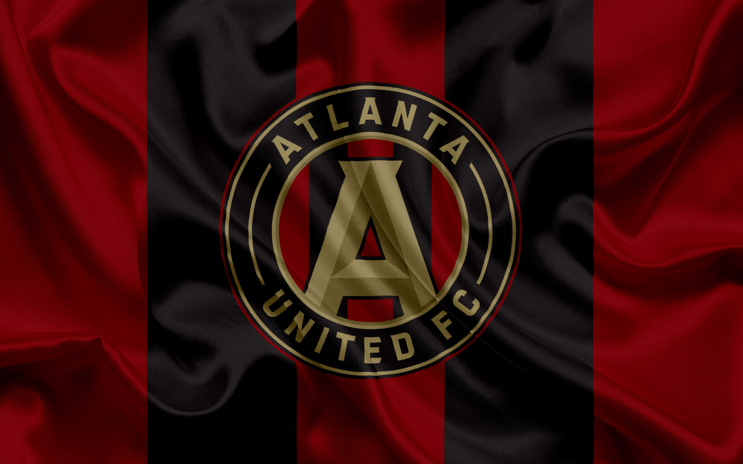 Atlanta United FC, red and black striped satin flag, metallic gold accents, 2K Desktop Wallpaper