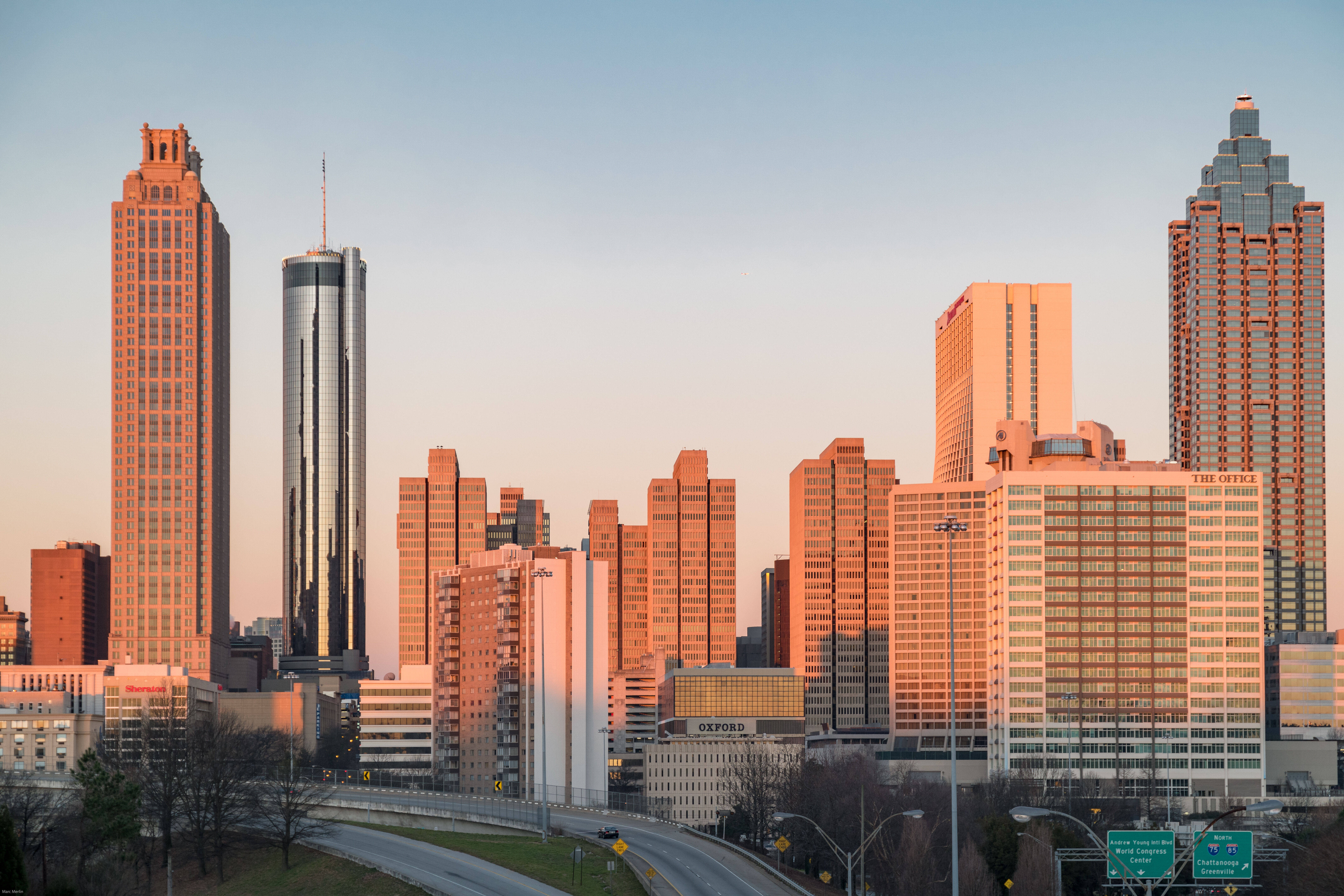Atlanta skyline, sunset, warm orange light, 5K Desktop Wallpaper