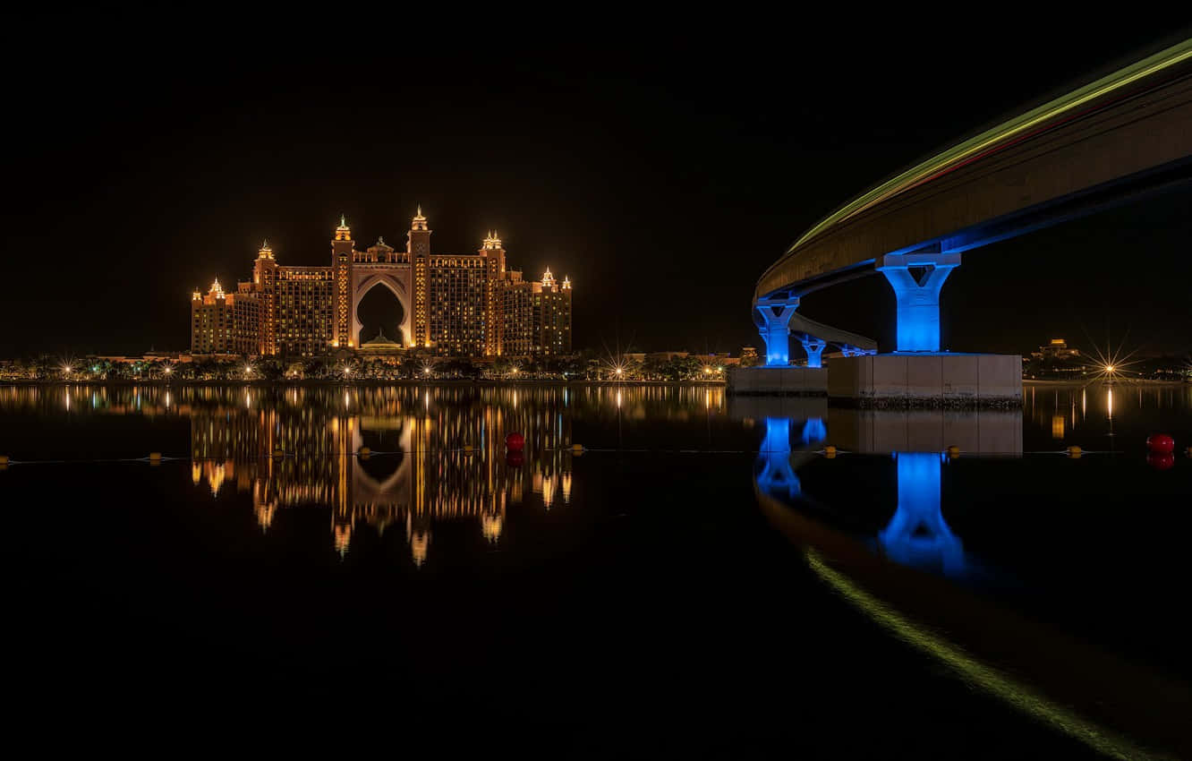 Atlantis Resort, glowing blue bridge, calm water, HD Desktop Wallpaper