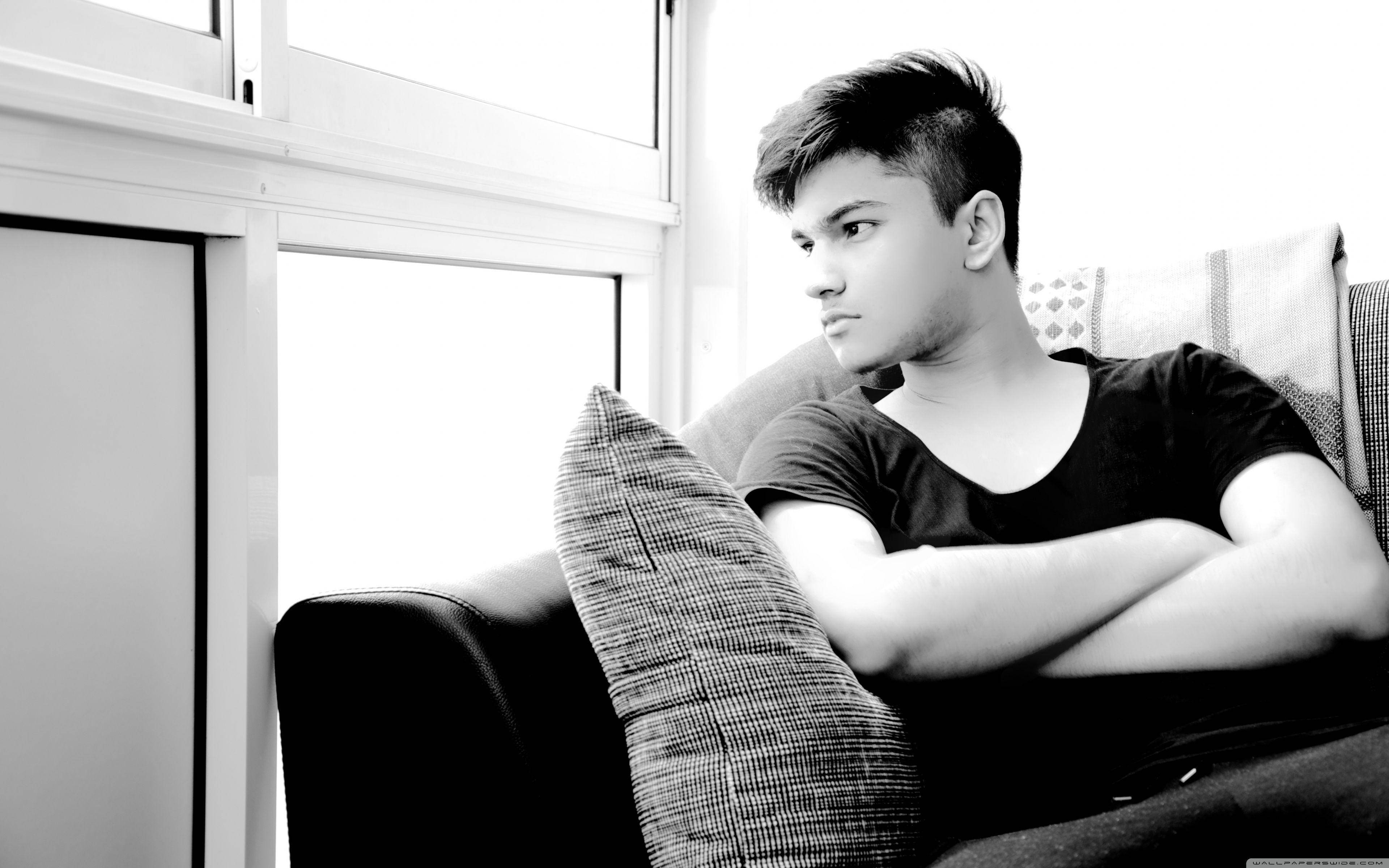 Attitude Boy, black shirt, couch, 4K Desktop Wallpaper