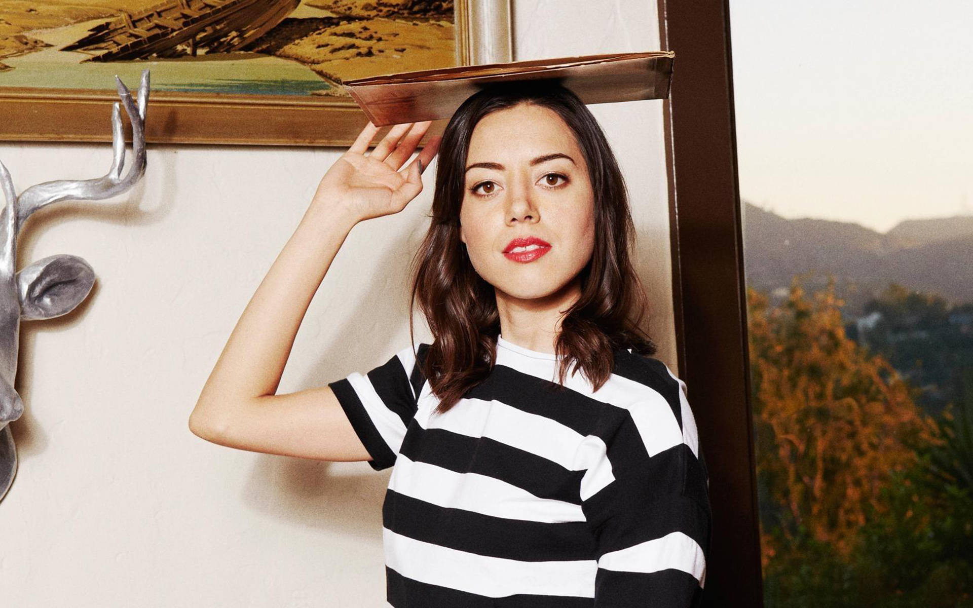 Aubrey Plaza, black and white striped shirt, wooden shelf, Full HD Desktop Wallpaper
