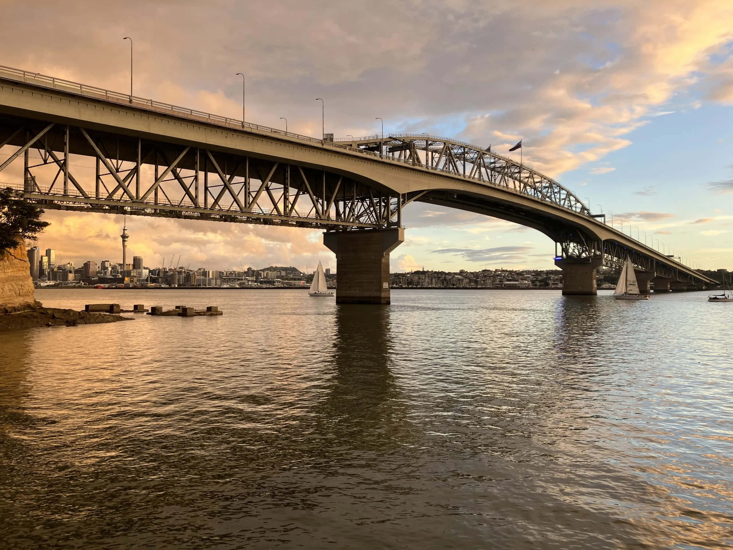 Auckland Harbour Bridge, sunset, calm harbor, 2K Desktop Wallpaper