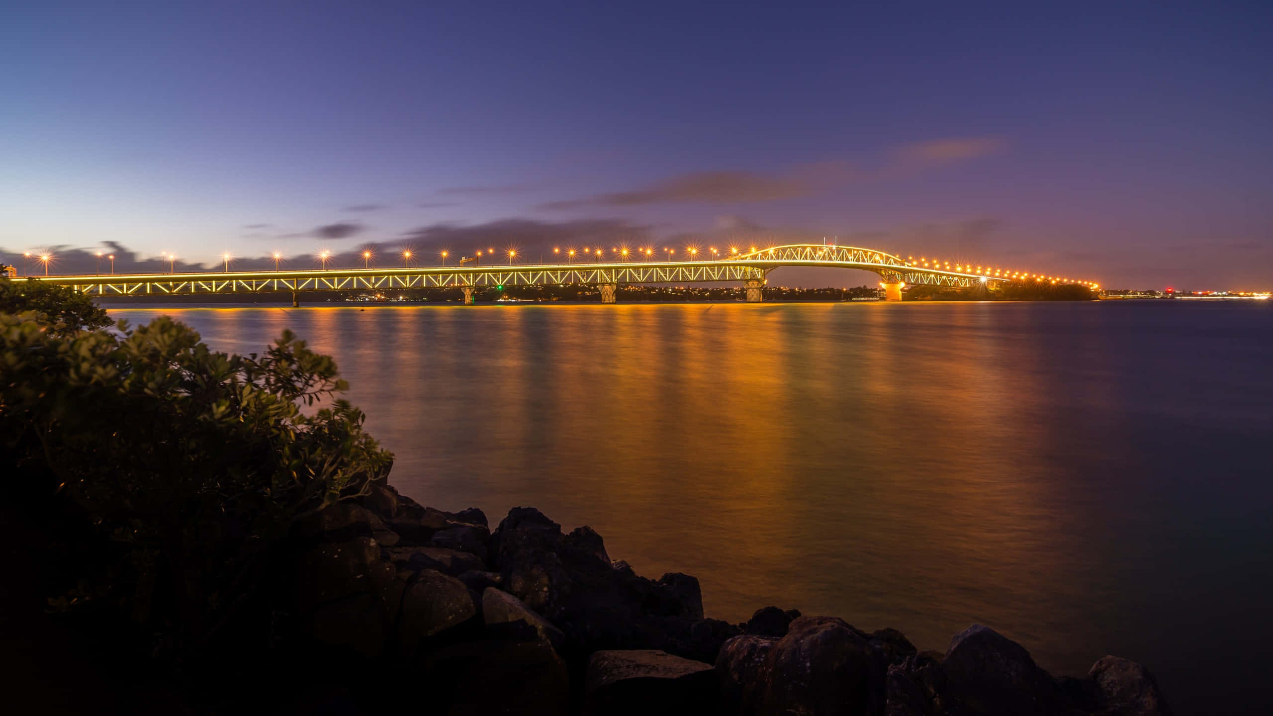Auckland Harbour Bridge, twilight, warm lights, 2K Desktop Wallpaper