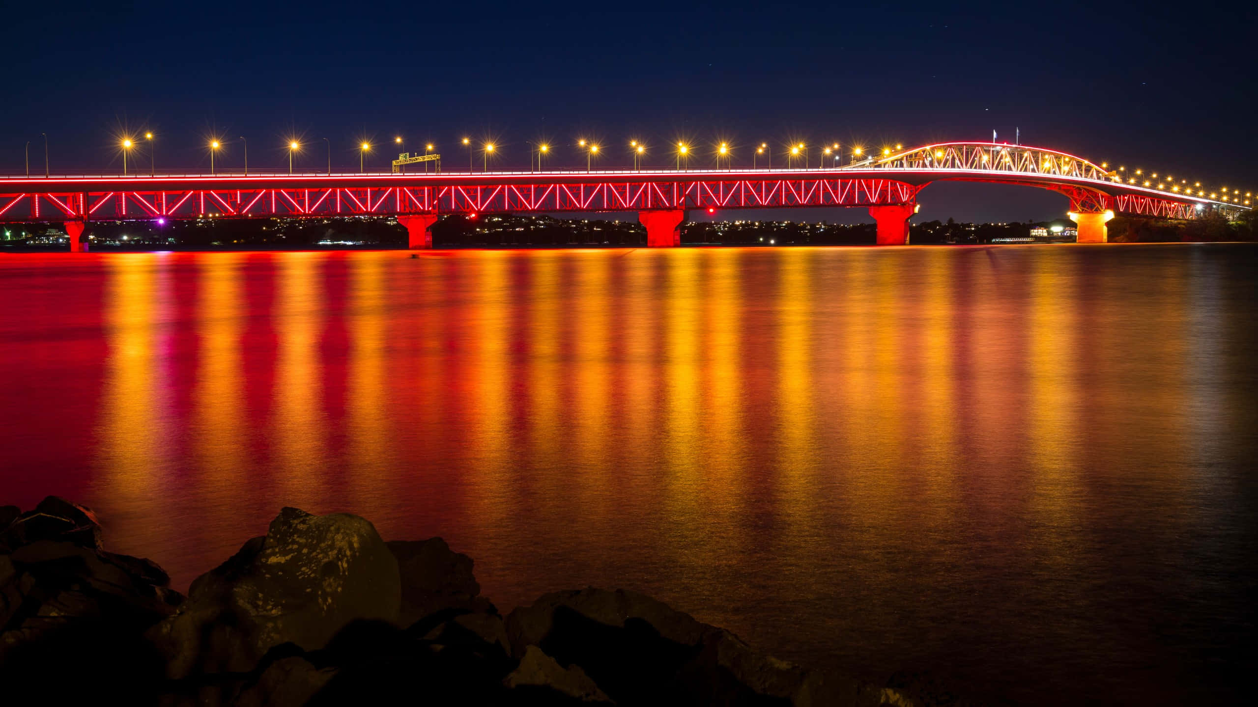 Auckland Harbour Bridge, night lights, glowing red, 2K Desktop Wallpaper