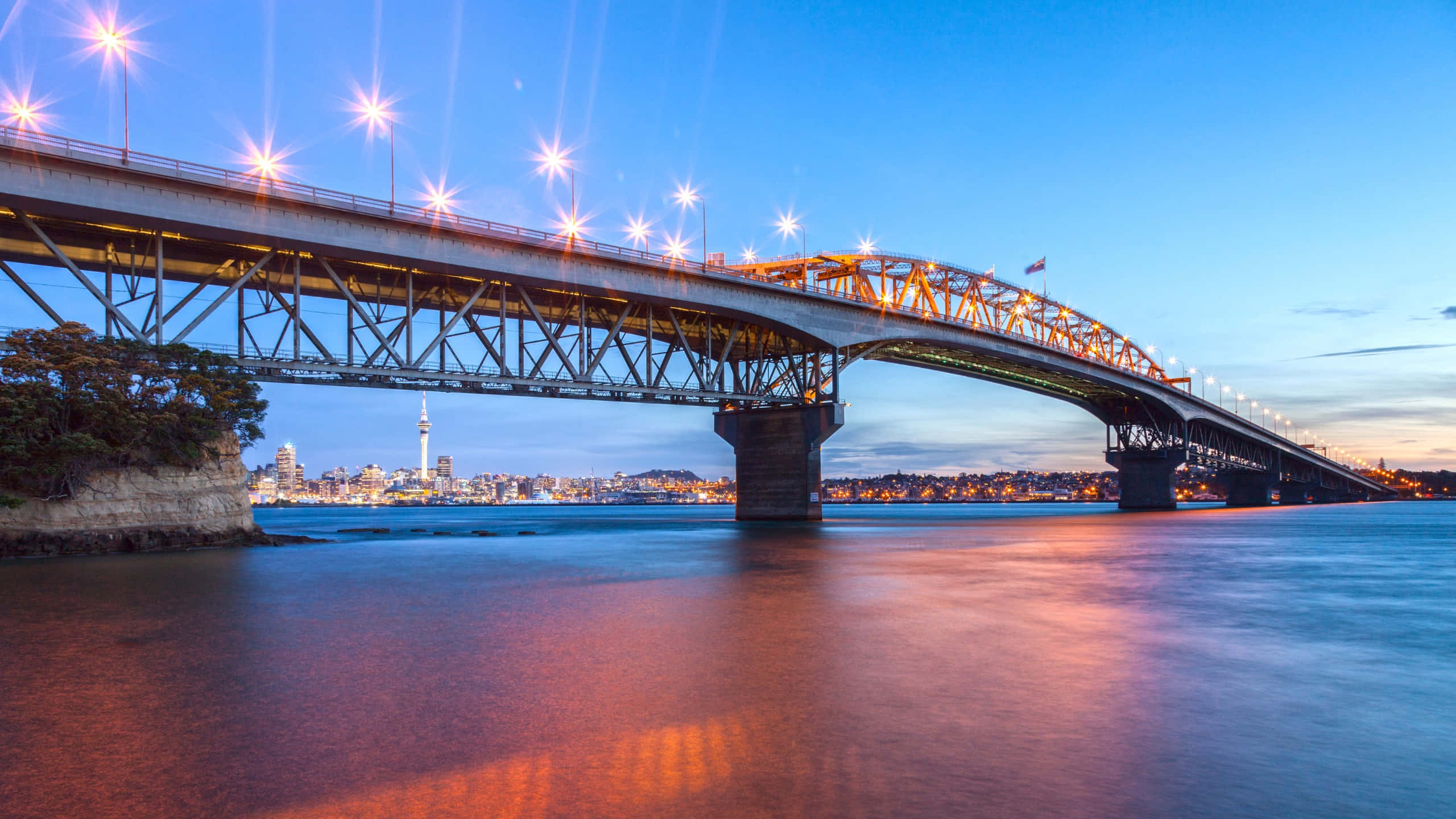 Auckland Harbour Bridge, twilight, calm water, 2K Desktop Wallpaper