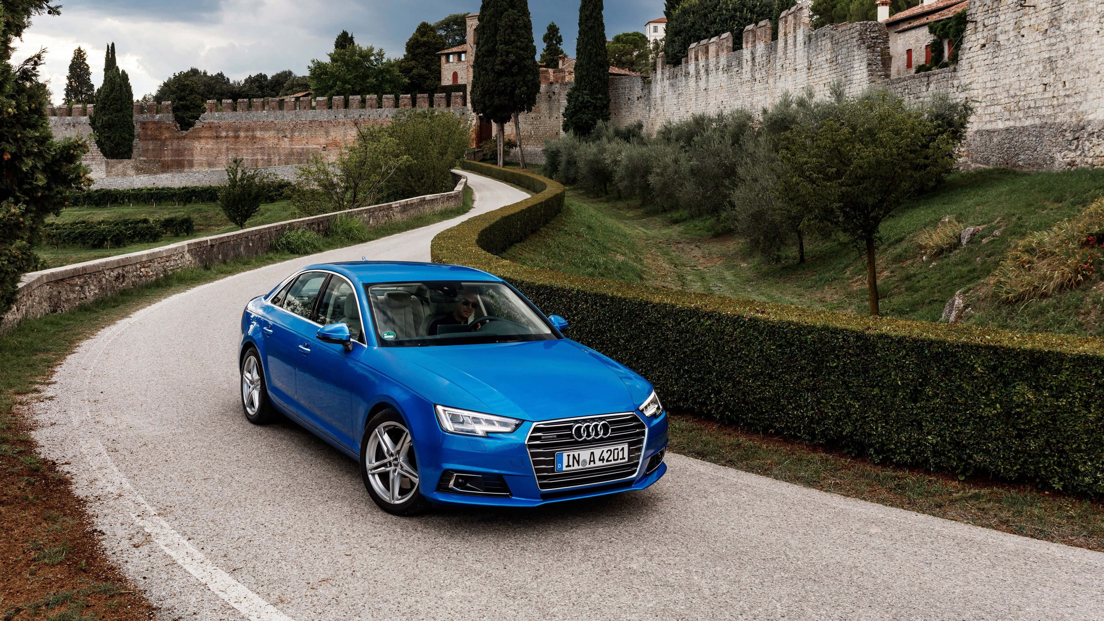 Audi A4, vibrant blue, winding stone road, 4K Desktop Wallpaper