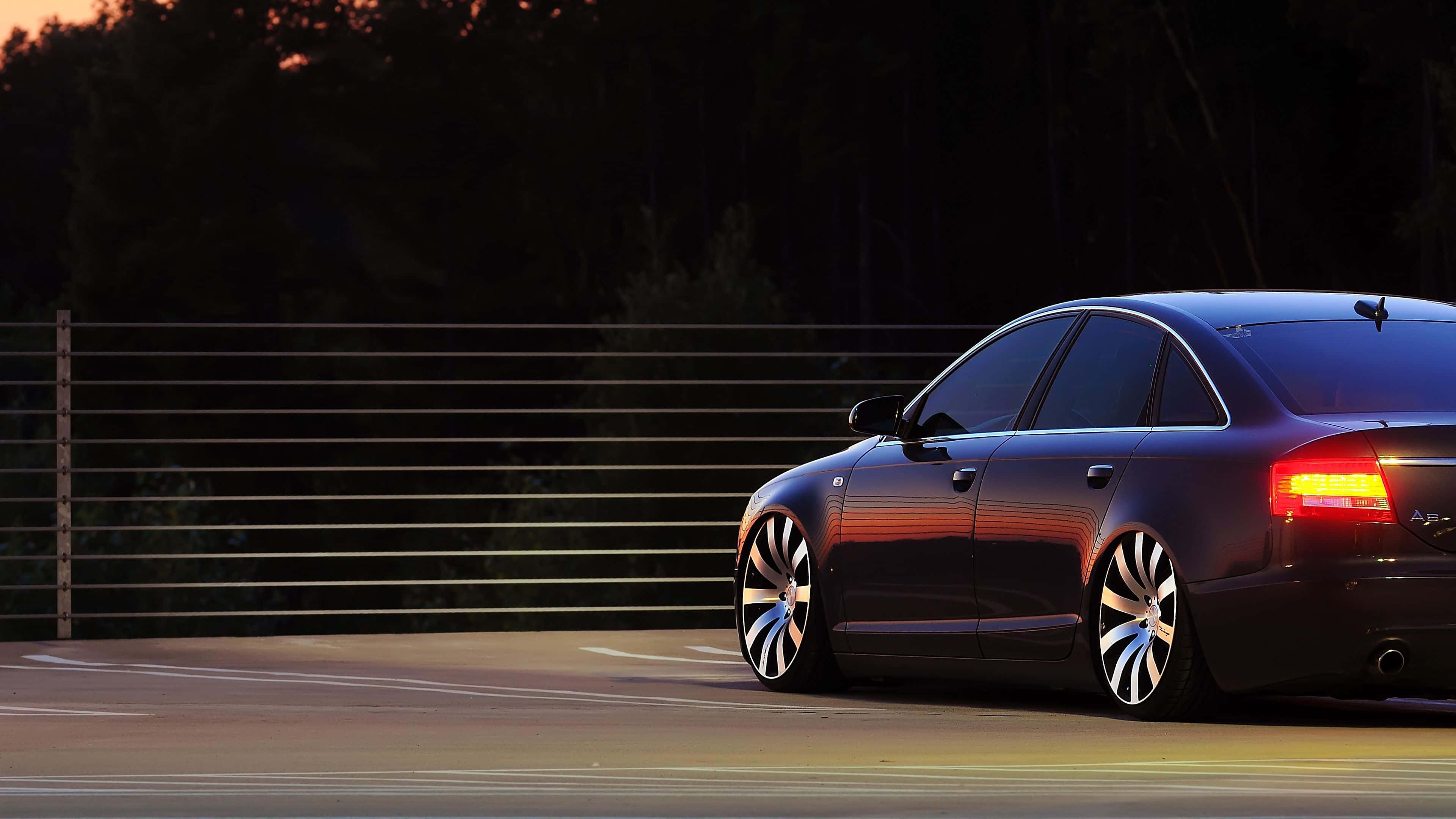 Audi A6, black sedan, glowing taillights, 4K Desktop Wallpaper