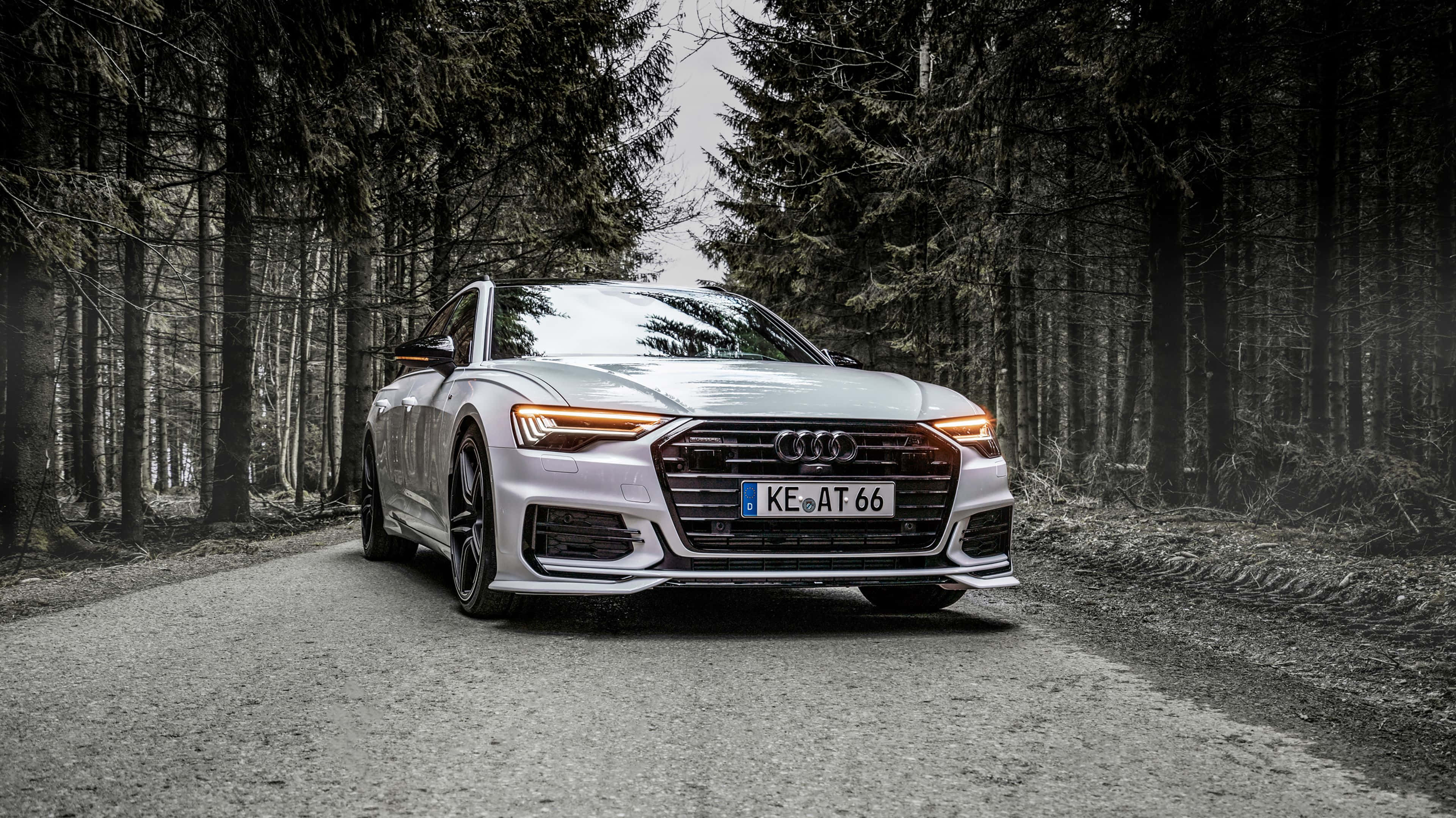 Audi A6, sleek silver, glowing headlights, 4K Desktop Wallpaper