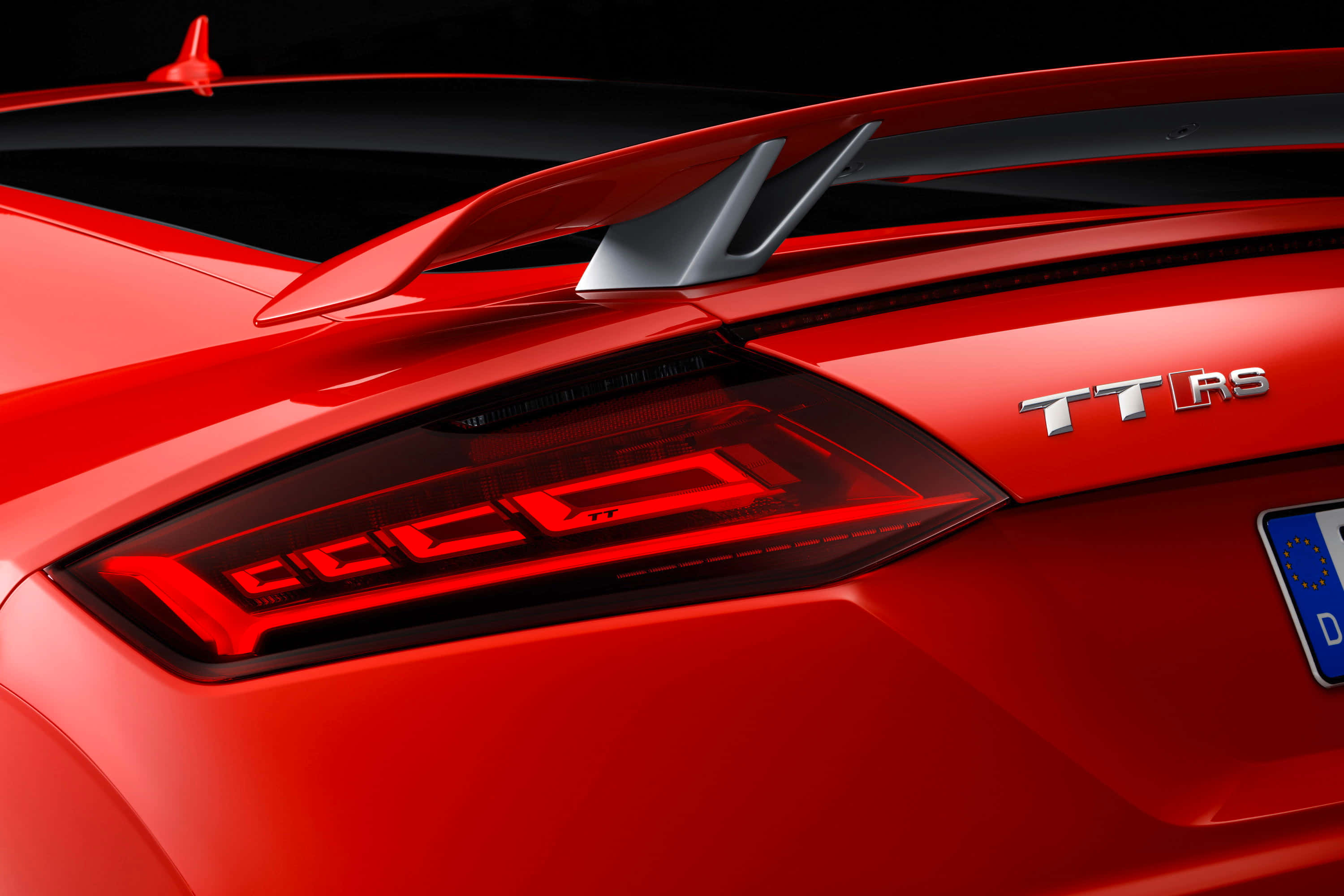 Audi TT RS, vibrant red, sleek taillights, 2K Desktop Wallpaper