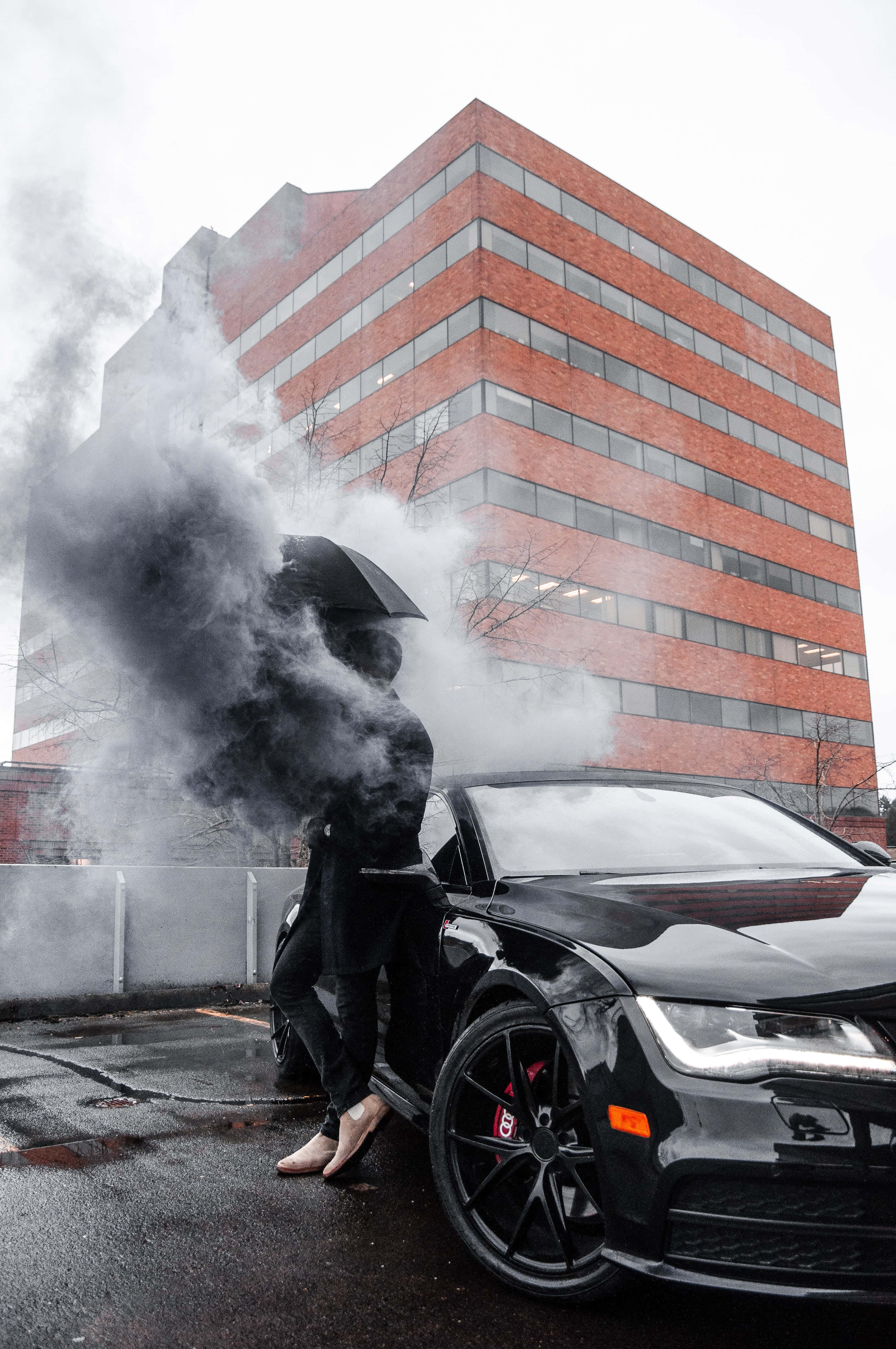 Black Audi, sleek black sports car, smoking, 4K Phone Wallpaper