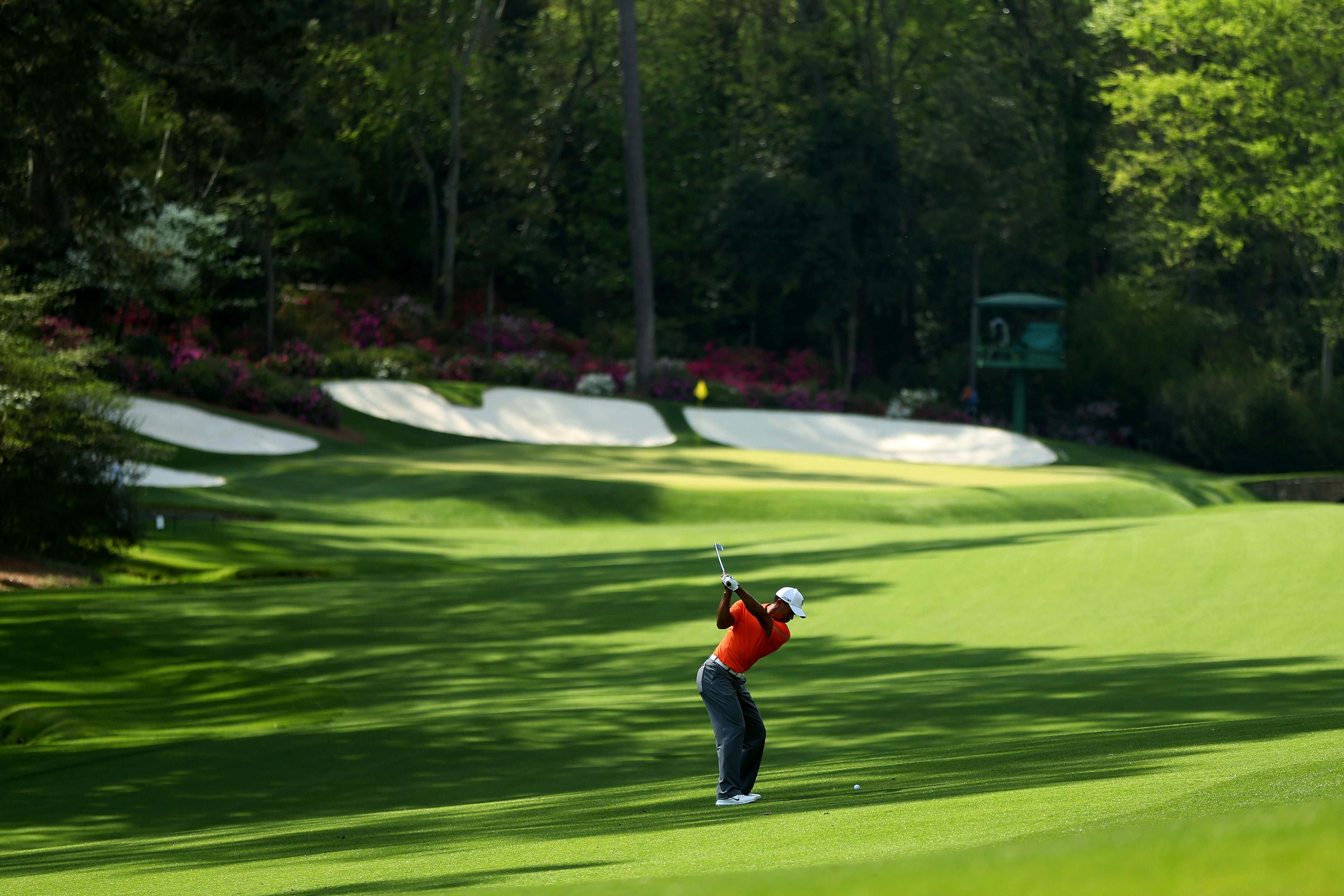 Augusta National Golf Course, orange shirt, sunlit green fairway, 5K Desktop Wallpaper