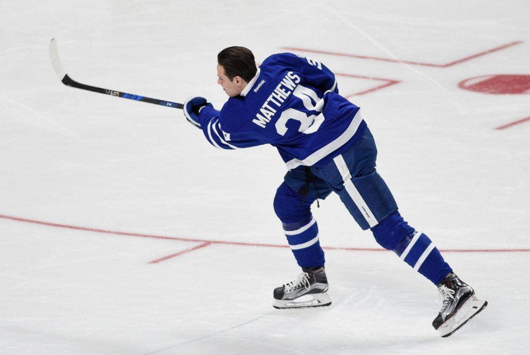 Auston Matthews, red lines, blue jersey, SD Desktop Wallpaper