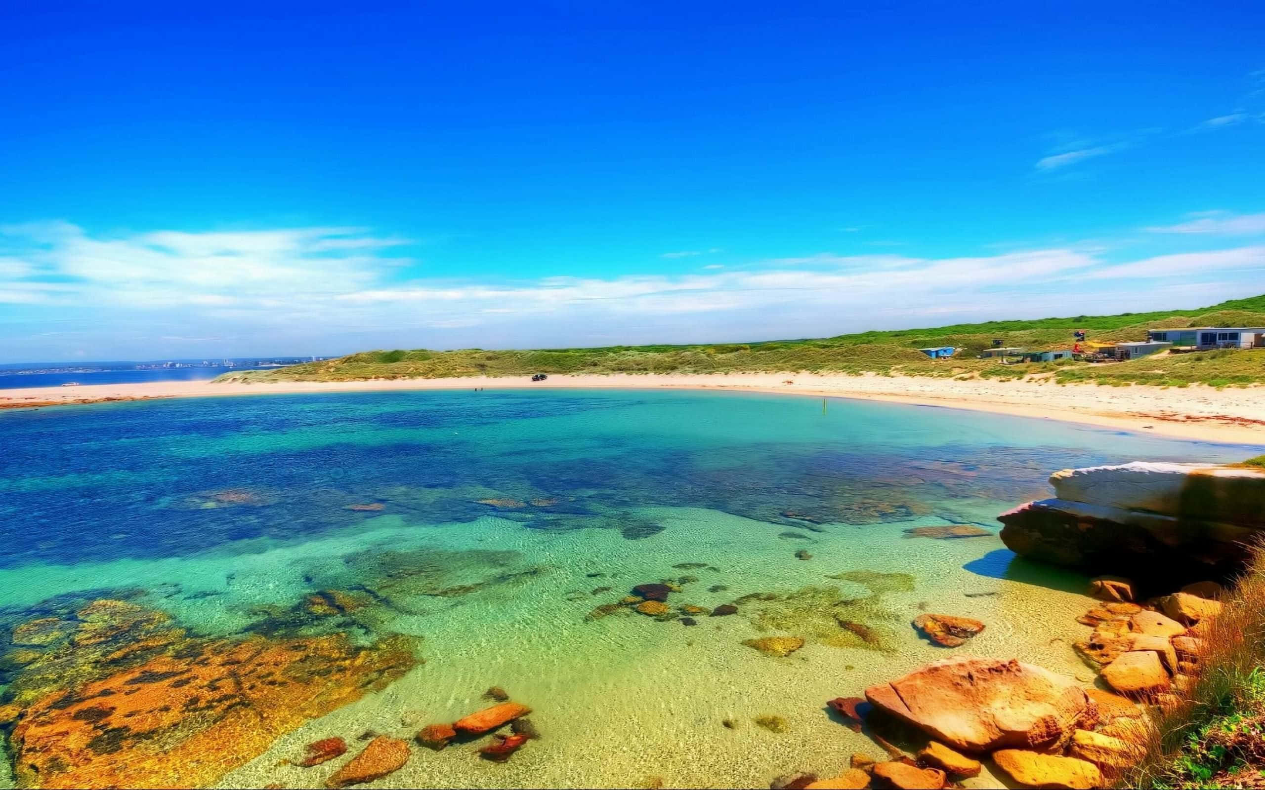 Australia Beach, crystal clear turquoise water, colorful rocks, 2K Desktop Wallpaper