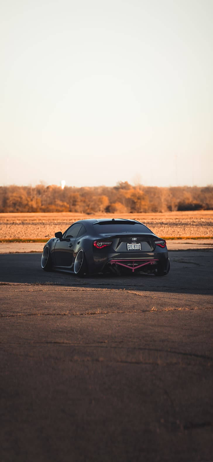 black sports car, pink accents, asphalt road, HD Phone Wallpaper