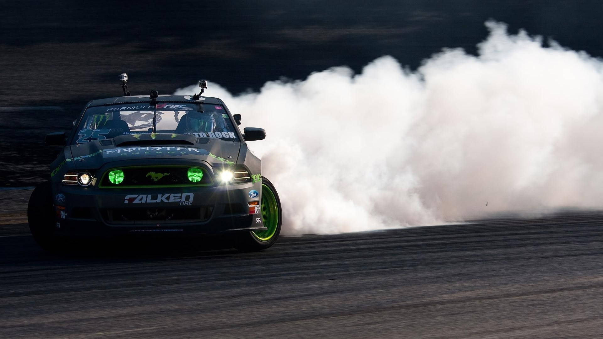 black drift car, glowing green headlights, smokes heavily, Full HD Desktop Wallpaper