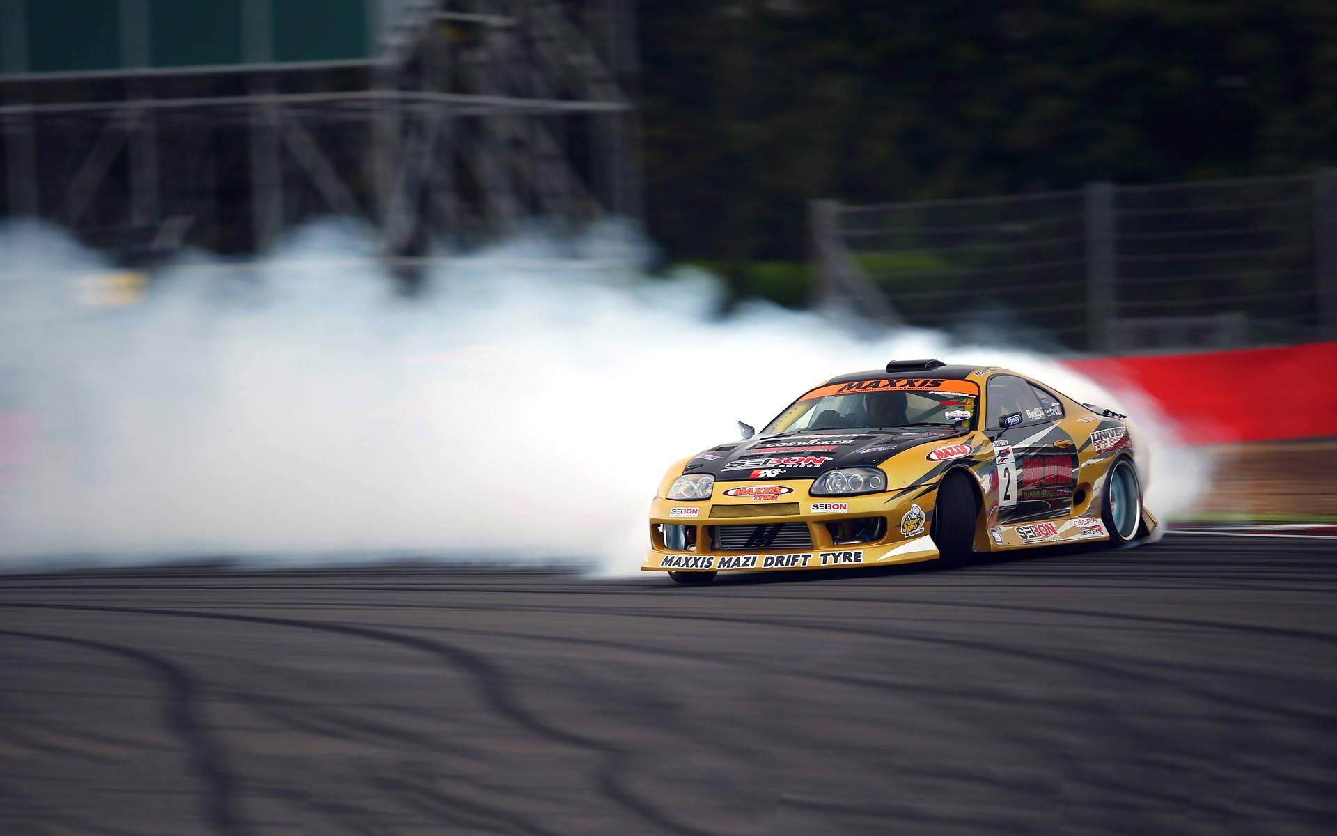 yellow and black drift car, smokes heavily, slides sideways, Full HD Desktop Wallpaper