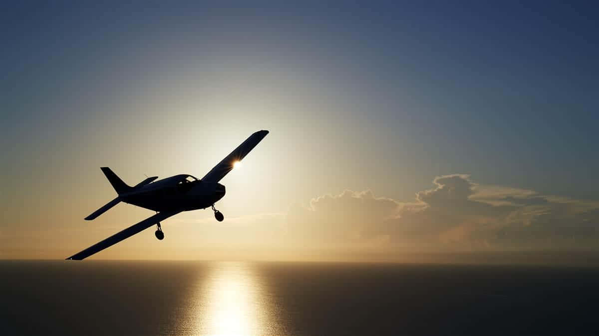 small airplane, glowing sunset, calm ocean waters, SD Desktop Wallpaper