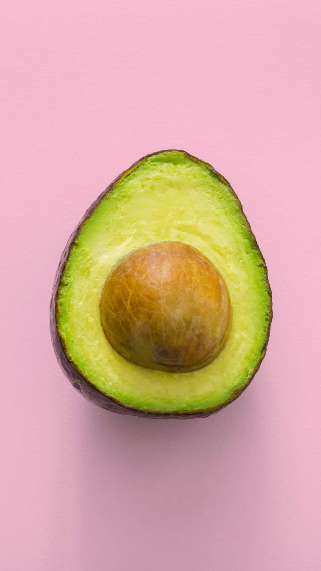 avocado, pink background, halved avocado, Full HD Phone Wallpaper