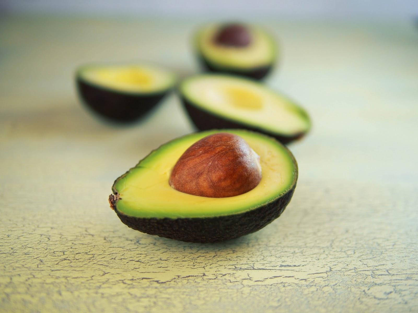 avocado, pit, weathered yellow surface, HD Desktop Wallpaper