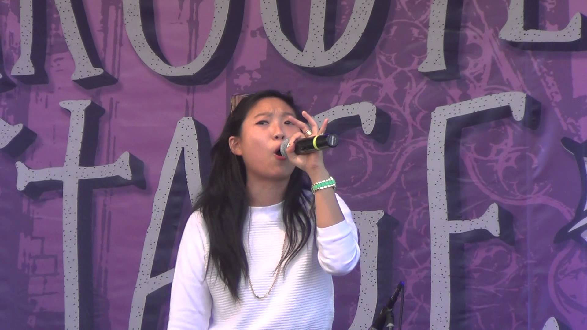 Awkwafina, purple stage backdrop, large white letters, Full HD Desktop Wallpaper