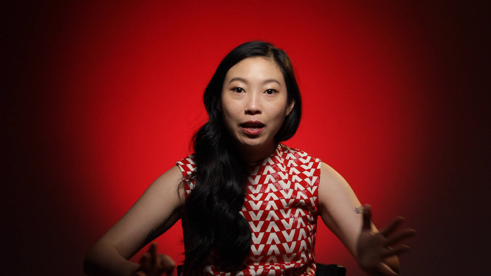 Awkwafina, red and white patterned top, vivid red gradient background, Full HD Desktop Wallpaper